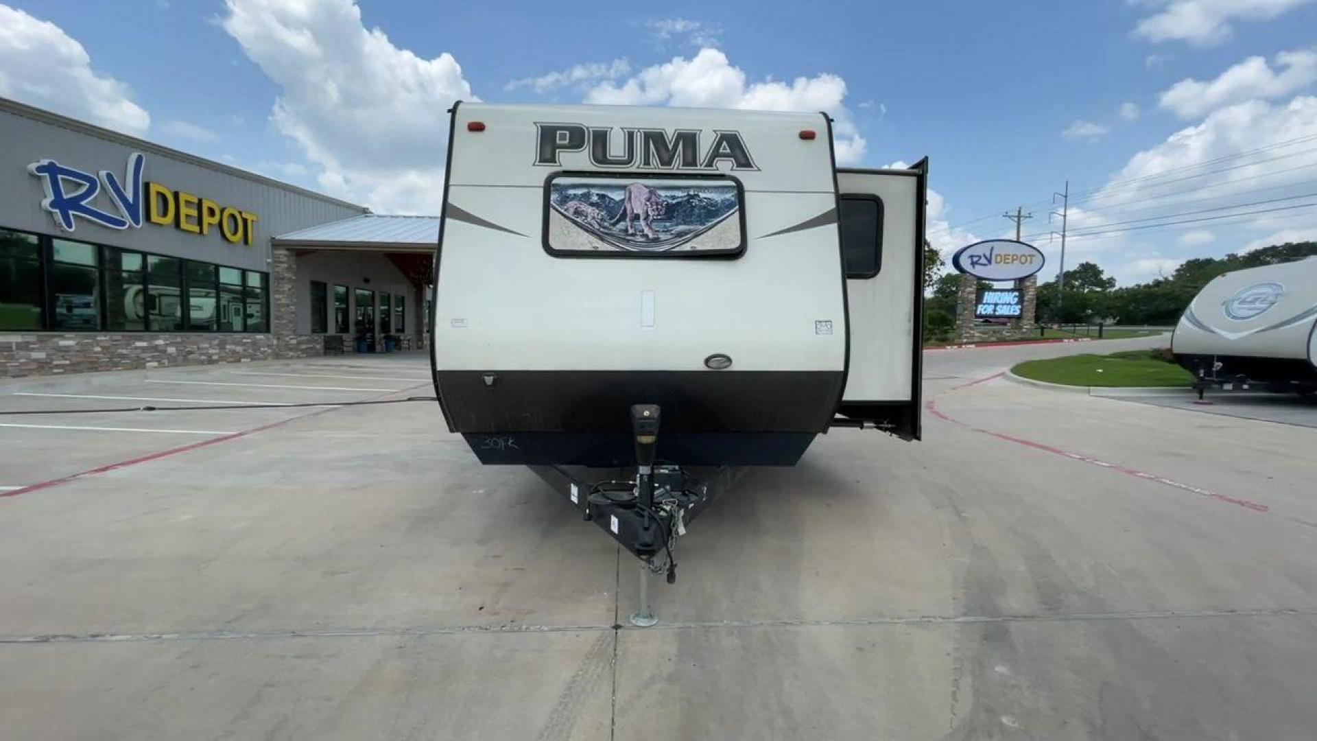 2016 TAN PALOMINO PUMA 30FKSS (4X4TPUF20GP) , Length: 34.75 ft. | Dry Weight: 7,992 lbs. | Gross Weight: 9,950 lbs. | Slides: 2 transmission, located at 4319 N Main Street, Cleburne, TX, 76033, (817) 221-0660, 32.435829, -97.384178 - Take advantage of the 2016 Palomino Puma 30FKSS Travel Trailer and embrace the spirit of adventure. With its stylish, functional, and comfortable design, this travel trailer provides a cozy living area for your road trips. This unit has dimensions of 34.75 ft in length, 8 ft in width, and 11.08 f - Photo#4