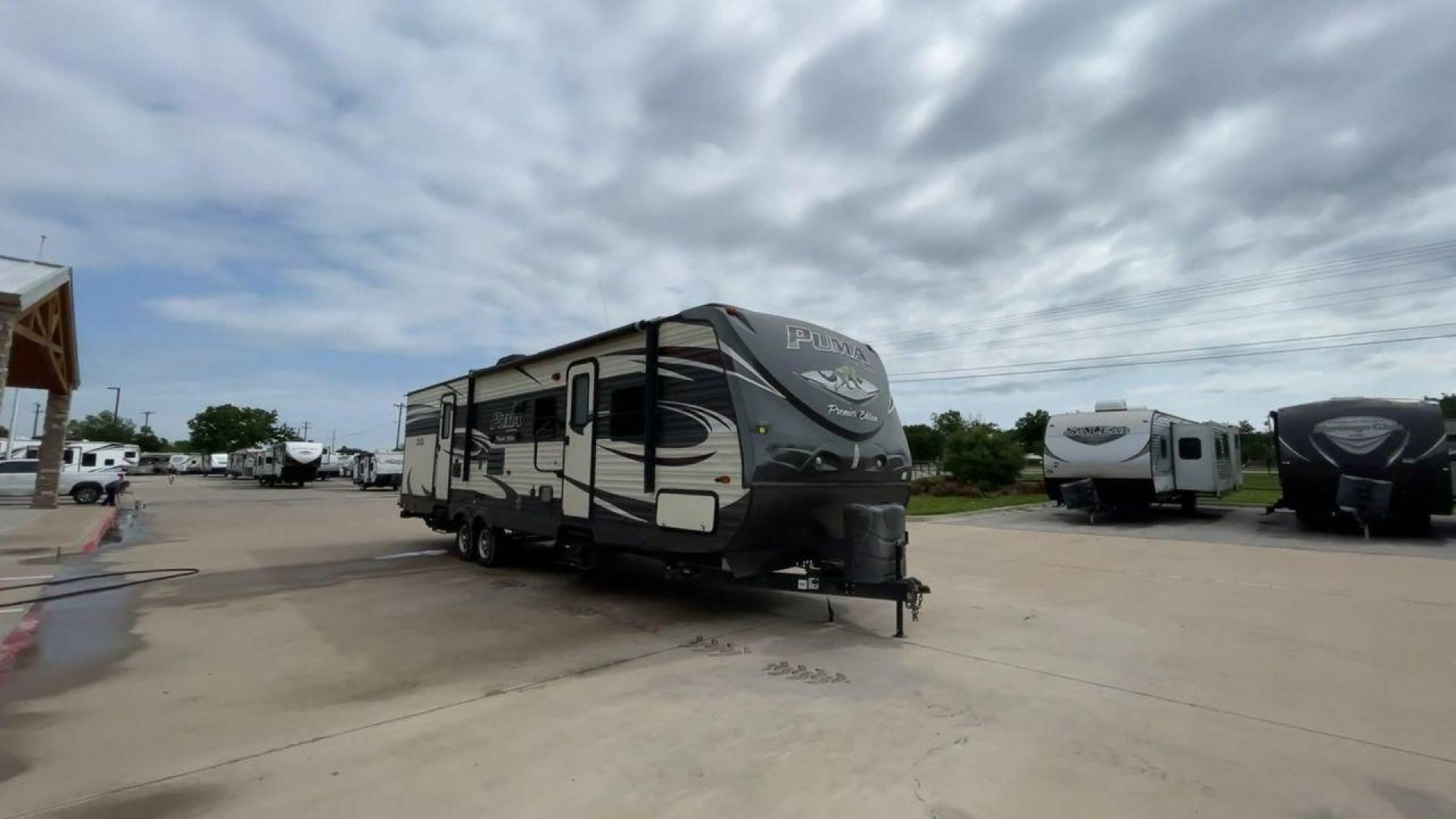 2016 PALOMINO PUMA 31BHSS (4X4TPUG27GP) , Length: 35.33 ft. | Dry Weight: 7,958 lbs. | Gross Weight: 9,600 lbs. | Slides: 2 transmission, located at 4319 N Main Street, Cleburne, TX, 76033, (817) 221-0660, 32.435829, -97.384178 - Photo#3