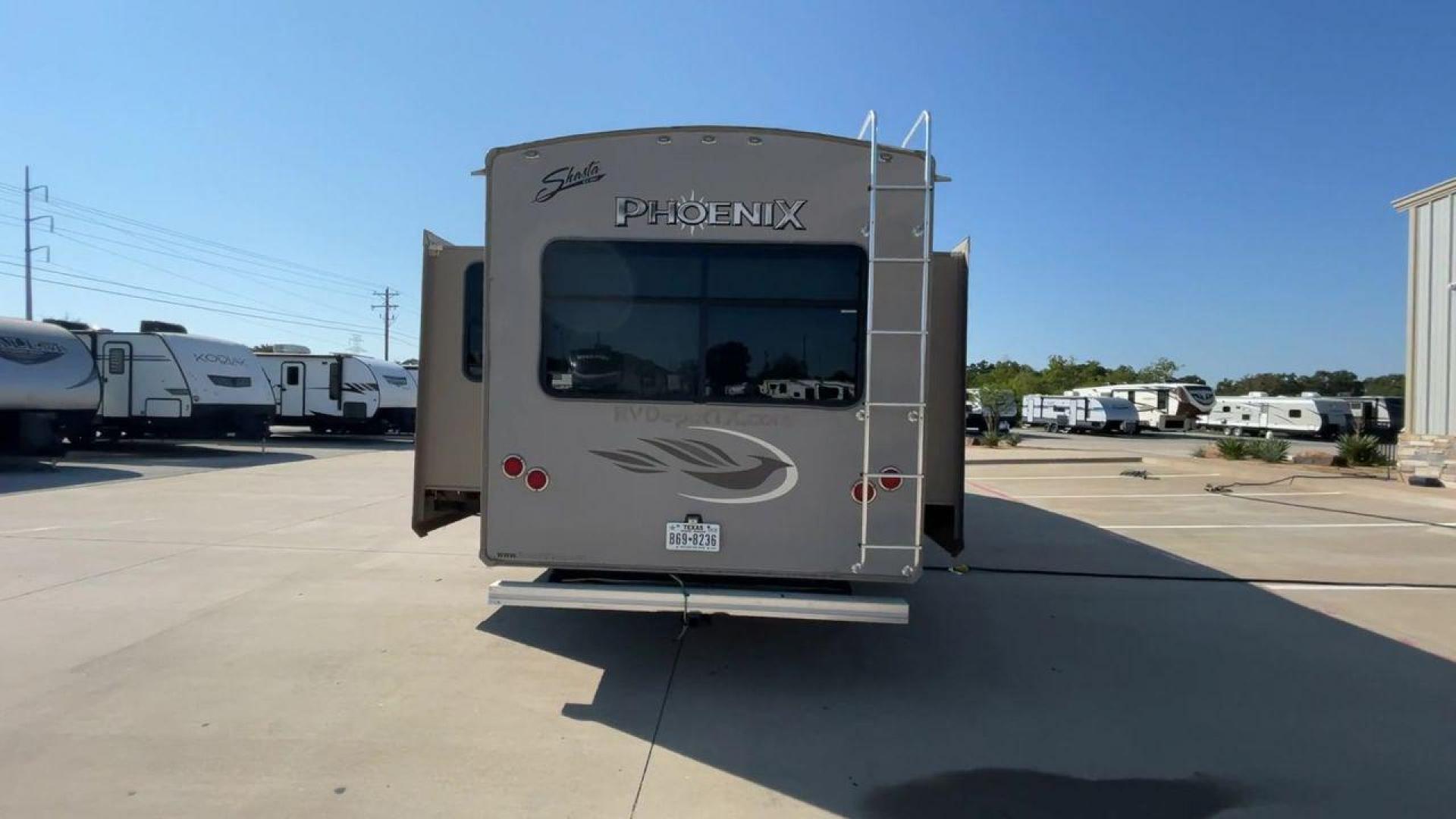 2016 TAN PHOENIX 32RE (5ZT3SPXB3GF) , Length: 33.92 ft. | Dry Weight: 9,120 lbs. | Gross Weight: 11,834 lbs. | Slides: 3 transmission, located at 4319 N Main Street, Cleburne, TX, 76033, (817) 221-0660, 32.435829, -97.384178 - This 2016 Phoenix 32RE is a well-equipped fifth wheel that provides excellent value. It is designed with 3 spacious slides and offers sleeping space for up to 6 people. It measures 33.92 ft. in length and 8.33 ft. in width. It has a dry weight of 9,120 lbs. and a GVWR of 11,834 lbs. This fifth wheel - Photo#8