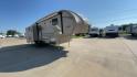 2016 TAN PHOENIX 32RE (5ZT3SPXB3GF) , Length: 33.92 ft. | Dry Weight: 9,120 lbs. | Gross Weight: 11,834 lbs. | Slides: 3 transmission, located at 4319 N Main Street, Cleburne, TX, 76033, (817) 221-0660, 32.435829, -97.384178 - This 2016 Phoenix 32RE is a well-equipped fifth wheel that provides excellent value. It is designed with 3 spacious slides and offers sleeping space for up to 6 people. It measures 33.92 ft. in length and 8.33 ft. in width. It has a dry weight of 9,120 lbs. and a GVWR of 11,834 lbs. This fifth wheel - Photo#3