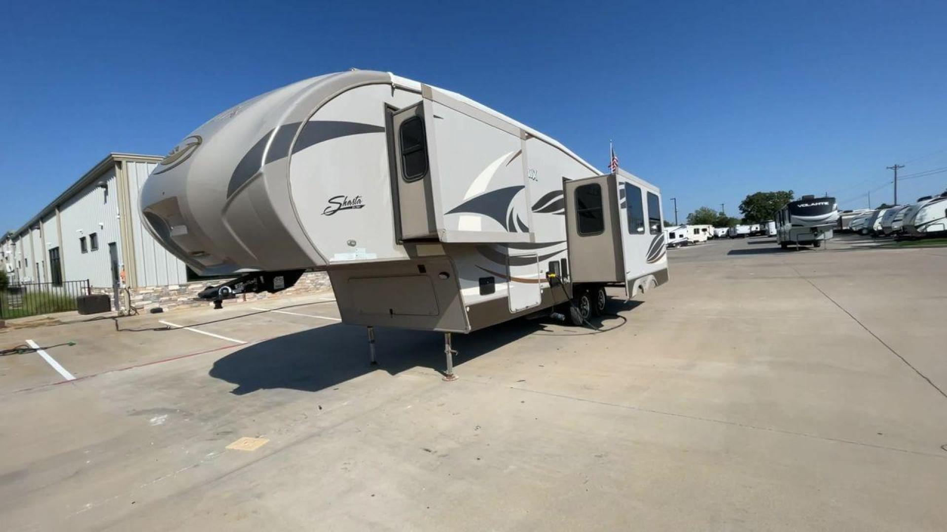 2016 TAN PHOENIX 32RE (5ZT3SPXB3GF) , Length: 33.92 ft. | Dry Weight: 9,120 lbs. | Gross Weight: 11,834 lbs. | Slides: 3 transmission, located at 4319 N Main Street, Cleburne, TX, 76033, (817) 221-0660, 32.435829, -97.384178 - This 2016 Phoenix 32RE is a well-equipped fifth wheel that provides excellent value. It is designed with 3 spacious slides and offers sleeping space for up to 6 people. It measures 33.92 ft. in length and 8.33 ft. in width. It has a dry weight of 9,120 lbs. and a GVWR of 11,834 lbs. This fifth wheel - Photo#5