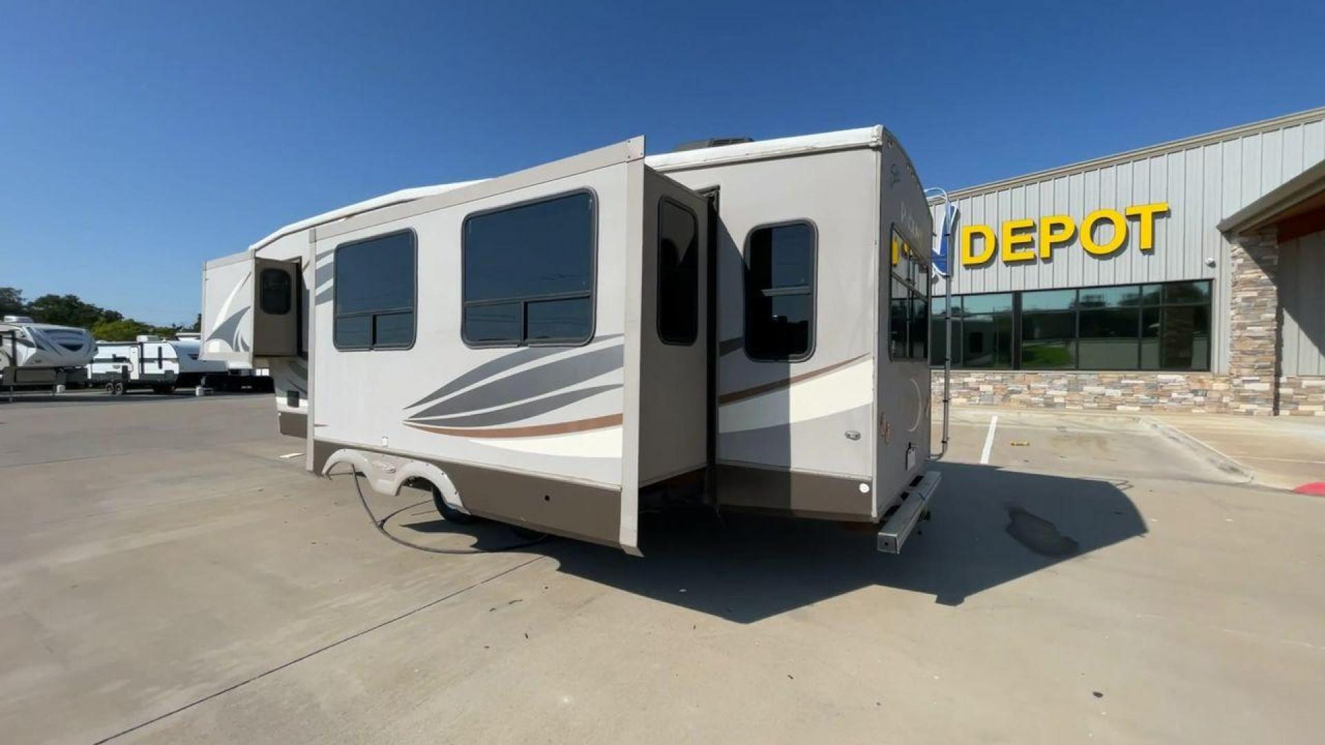 2016 TAN PHOENIX 32RE (5ZT3SPXB3GF) , Length: 33.92 ft. | Dry Weight: 9,120 lbs. | Gross Weight: 11,834 lbs. | Slides: 3 transmission, located at 4319 N Main Street, Cleburne, TX, 76033, (817) 221-0660, 32.435829, -97.384178 - This 2016 Phoenix 32RE is a well-equipped fifth wheel that provides excellent value. It is designed with 3 spacious slides and offers sleeping space for up to 6 people. It measures 33.92 ft. in length and 8.33 ft. in width. It has a dry weight of 9,120 lbs. and a GVWR of 11,834 lbs. This fifth wheel - Photo#7