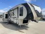 2016 TAN SABRE 365MB (4X4FSRN29G3) , Length: 42.42 ft. | Dry Weight: 12,994 lbs. | Gross Weight: 15,500 lbs. | Slides: 4 transmission, located at 4319 N Main Street, Cleburne, TX, 76033, (817) 221-0660, 32.435829, -97.384178 - The 2016 Sabre 365MB Fifth Wheel stretches 42.42 feet in length, with a commanding presence on the road and at the campground. The exterior is finished in a beige and black color scheme, accented with bold swooping graphics that add an athletic flair to its overall look. The side profile features fo - Photo#22