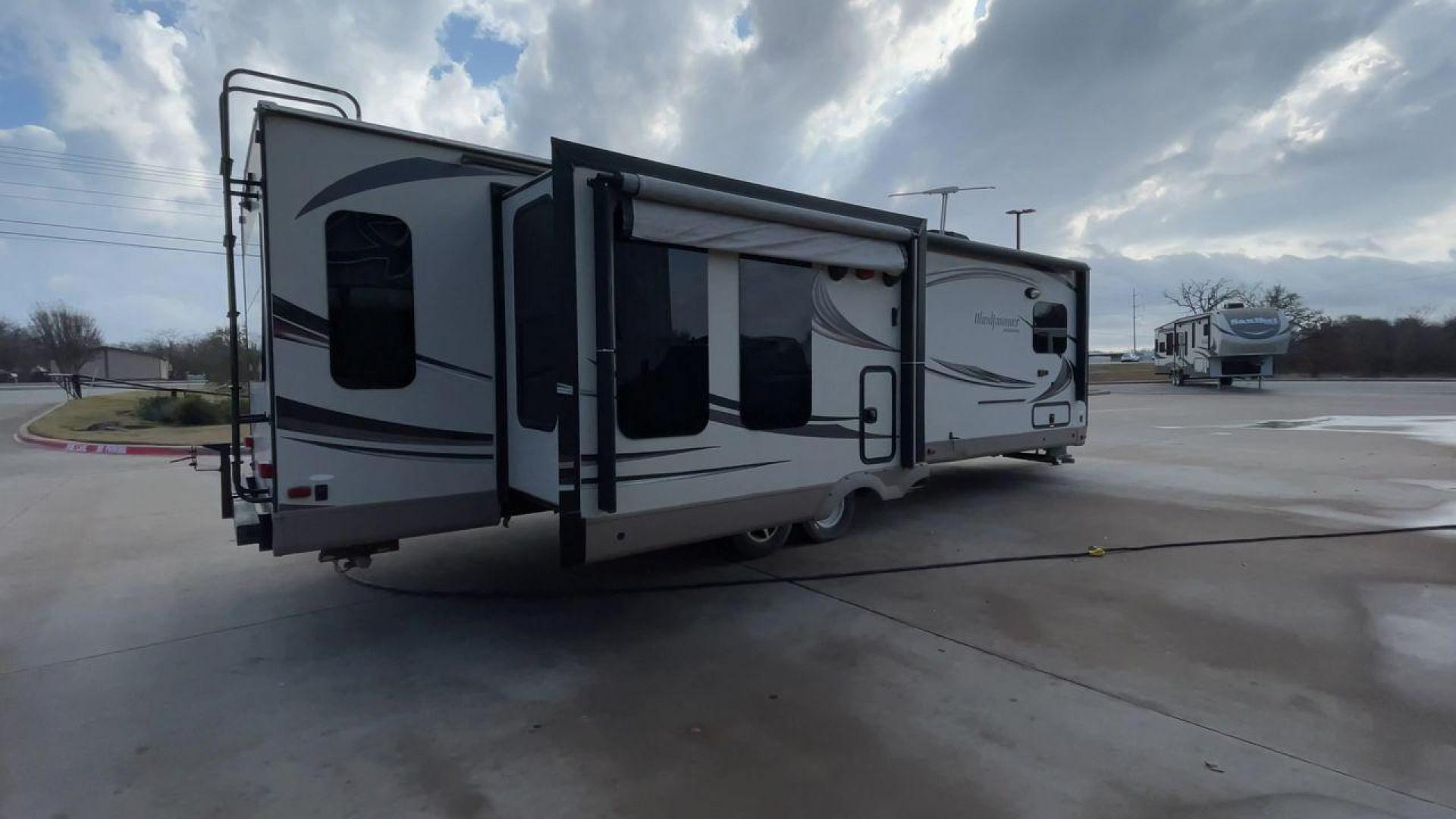 2016 WINDJAMMER 3029W (4X4TRLF23G1) , Length: 35 ft. | Dry Weight: 7,692 lbs. | Slides: 3 transmission, located at 4319 N Main Street, Cleburne, TX, 76033, (817) 221-0660, 32.435829, -97.384178 - Photo#1