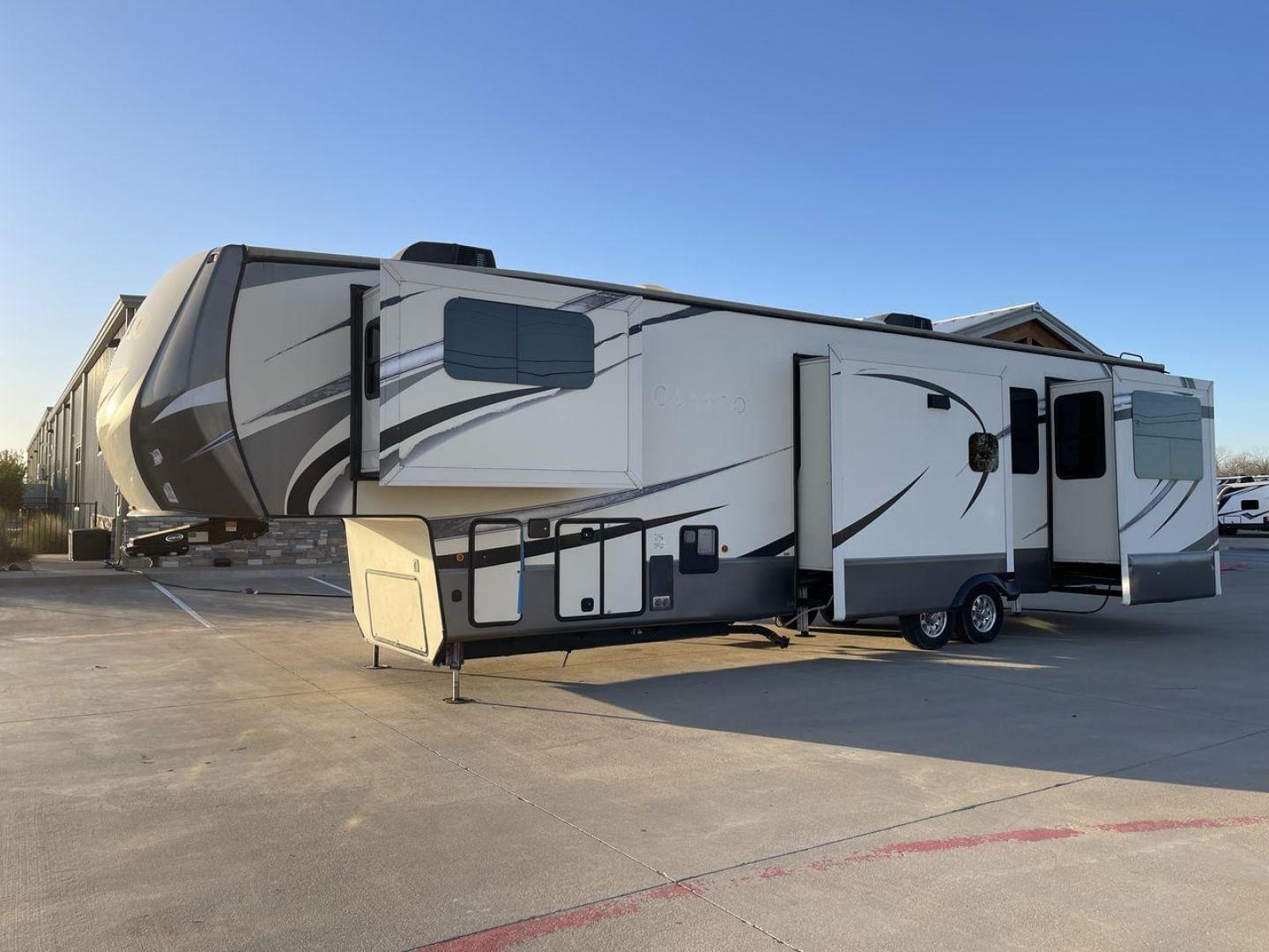 2017 TAN CAMEO 3701RD (4V0FC3727HR) , Length: 42.08 ft. | Dry Weight: 13,848 lbs. | Gross Weight: 16,678 lbs. | Slides: 5 transmission, located at 4319 N Main Street, Cleburne, TX, 76033, (817) 221-0660, 32.435829, -97.384178 - At 42.08 feet in length and boasting five slideouts, the Cameo 3701RD is a masterclass in RV luxury that beckons you to embark on a journey where every mile is marked by comfort, style, and unparalleled sophistication. Crafted by CrossRoads RV, the Cameo series is celebrated for its unparalleled cra - Photo#24