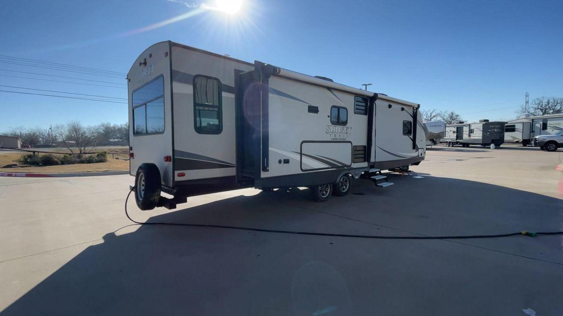 2017 TAN CROSSROADS RV SUNSET TRAIL 33SI (4YDT33S27H5) , Length: 37 ft. | Dry Weight: 7,554 lbs. | Gross Weight: 9,895 lbs. | Slides: 3 transmission, located at 4319 N Main Street, Cleburne, TX, 76033, (817) 221-0660, 32.435829, -97.384178 - Photo#1