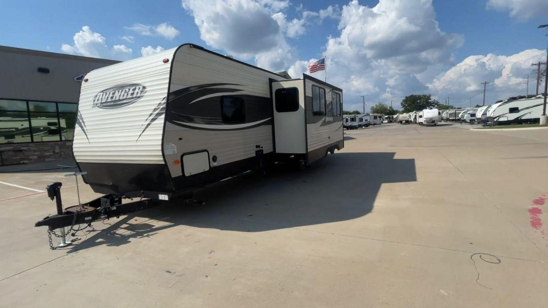 2017 TAN FOREST RIVER AVENGER 31DBS (5ZT2AVWB1HB) , Length: 35.75 ft | Dry Weight: 7,189 lbs. | Gross Weight: 9,589 lbs. | Slides: 1 transmission, located at 4319 N Main Street, Cleburne, TX, 76033, (817) 221-0660, 32.435829, -97.384178 - This is the 2017 Forest River Avenger 31DBS. It's your ticket to fun and excitement on the open road with your family. The length of this travel trailer is 35.75 feet and its dry weight is 7,189 lbs. When you walk inside, you'll find a plan that was made for comfort and ease. The bathroom in the bac - Photo#5