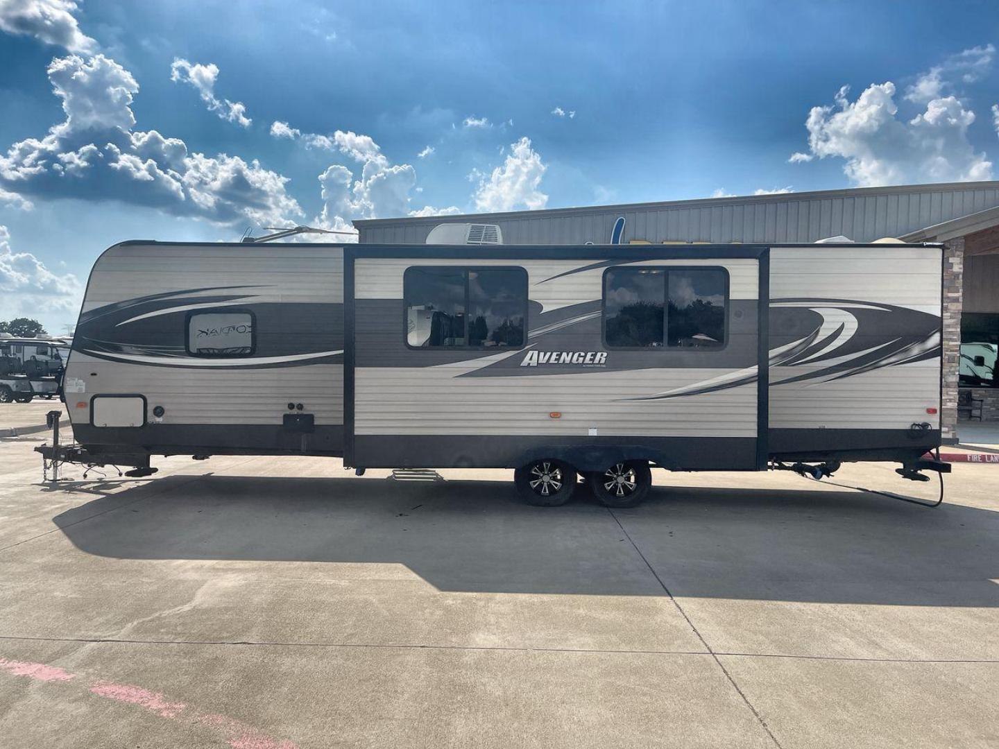 2017 TAN FOREST RIVER AVENGER 31DBS (5ZT2AVWB1HB) , Length: 35.75 ft | Dry Weight: 7,189 lbs. | Gross Weight: 9,589 lbs. | Slides: 1 transmission, located at 4319 N Main Street, Cleburne, TX, 76033, (817) 221-0660, 32.435829, -97.384178 - This is the 2017 Forest River Avenger 31DBS. It's your ticket to fun and excitement on the open road with your family. The length of this travel trailer is 35.75 feet and its dry weight is 7,189 lbs. When you walk inside, you'll find a plan that was made for comfort and ease. The bathroom in the bac - Photo#24