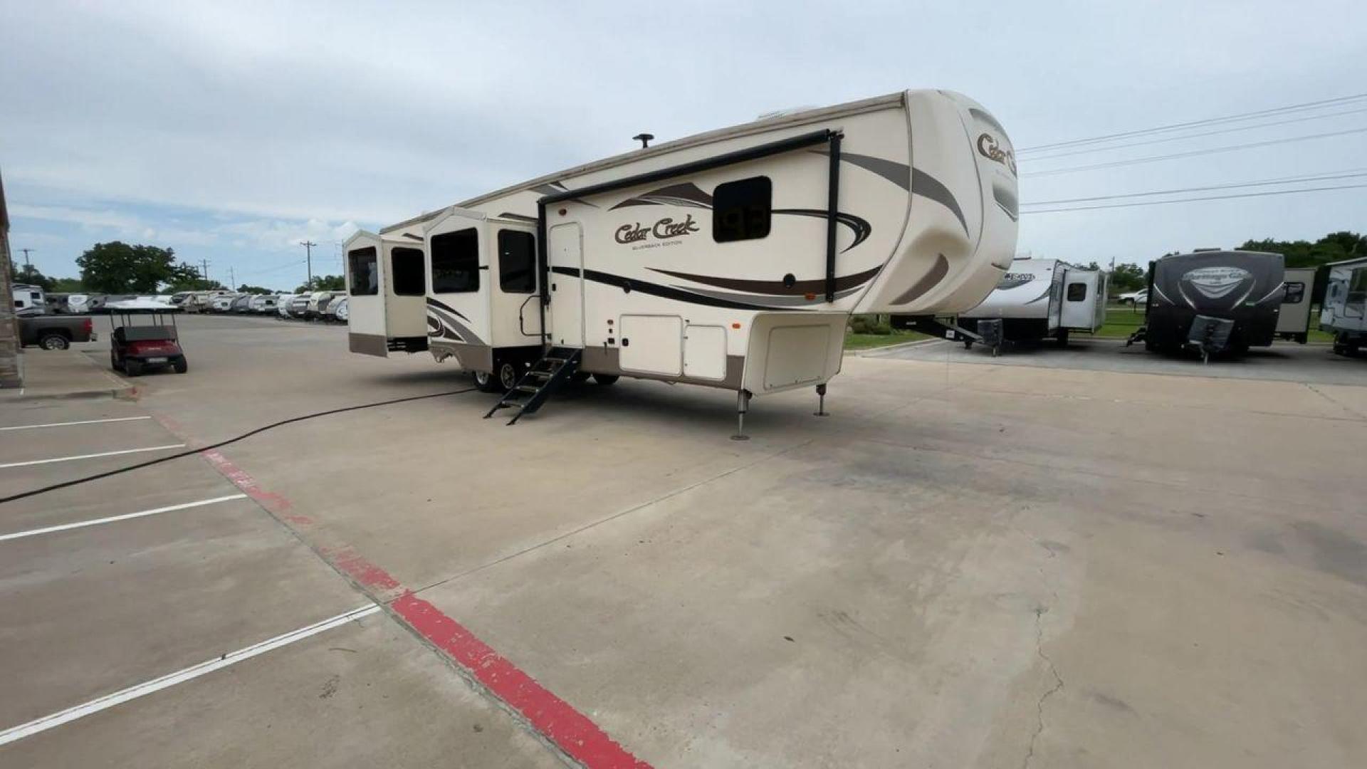 2017 WHITE FOREST RIVER CEDAR CREEK SILVERBA (4X4FCRN20HS) , located at 4319 N Main Street, Cleburne, TX, 76033, (817) 221-0660, 32.435829, -97.384178 - Photo#3