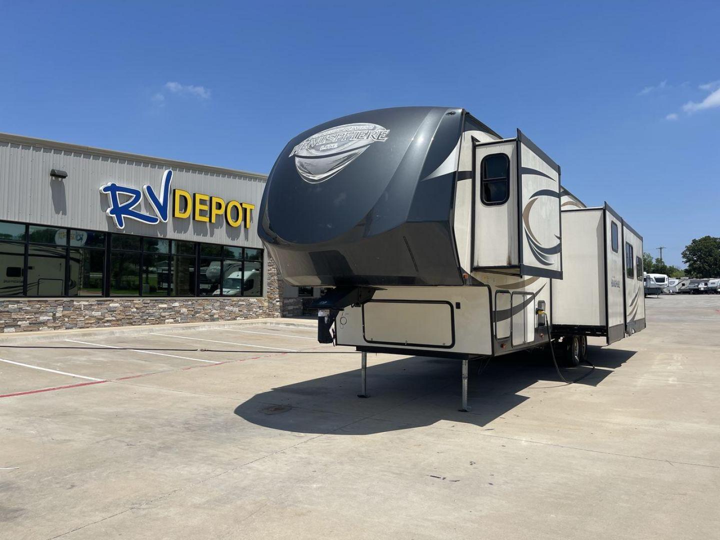 2017 TAN FOREST RIVER SALEM HEMISPHERE (4X4FSBN23HV) , Length: 42 ft.| Dry Weight: 10,924 lbs.| Slides: 4 transmission, located at 4319 N Main Street, Cleburne, TX, 76033, (817) 221-0660, 32.435829, -97.384178 - This is a 2017 Salem Hemisphere 368RLBHK fifth wheel. It has dimensions of 42 ft in length, 8 ft in width, and a 13.17 ft height. It has a dry weight of 10,924 lbs and a payload capacity of 3,156 lbs with a hitch weight of 2,080 lbs. This comes with four power-retractable slideouts and one 19 ft pow - Photo#0