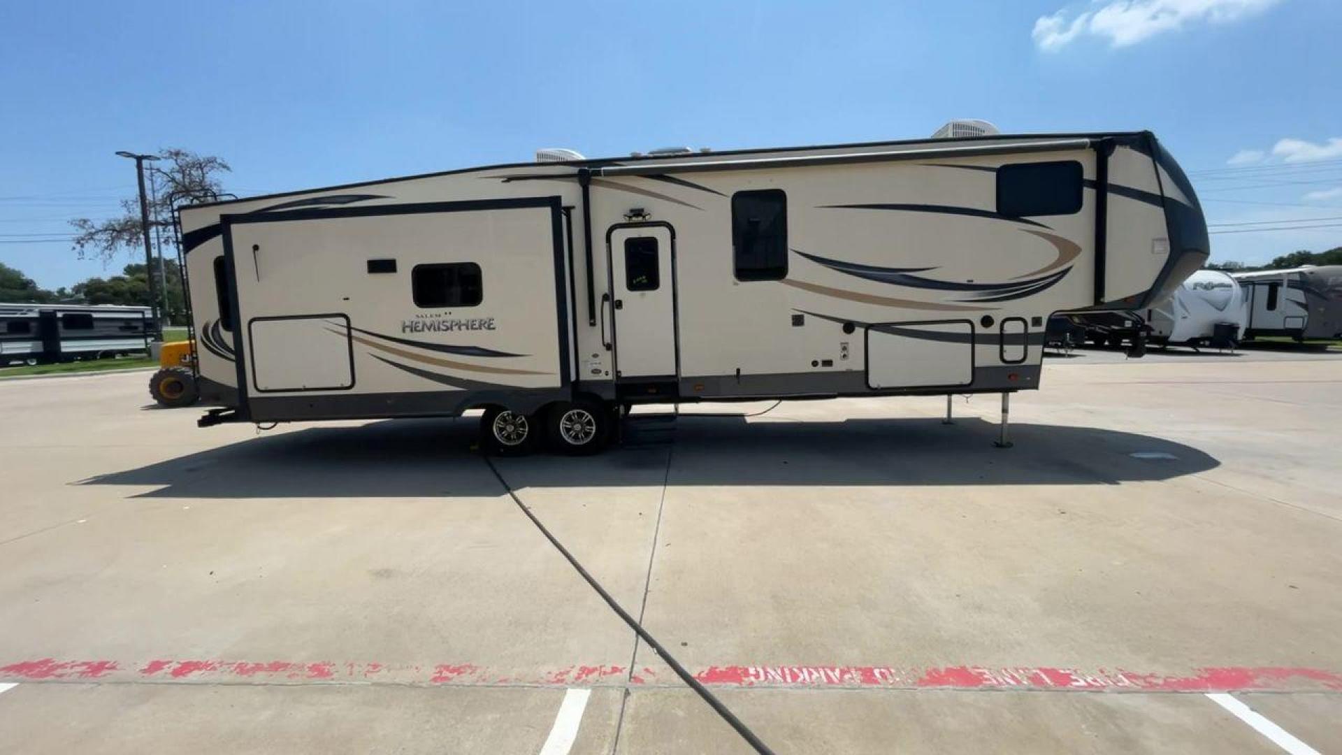 2017 TAN FOREST RIVER SALEM HEMISPHERE (4X4FSBN23HV) , Length: 42 ft.| Dry Weight: 10,924 lbs.| Slides: 4 transmission, located at 4319 N Main Street, Cleburne, TX, 76033, (817) 221-0660, 32.435829, -97.384178 - This is a 2017 Salem Hemisphere 368RLBHK fifth wheel. It has dimensions of 42 ft in length, 8 ft in width, and a 13.17 ft height. It has a dry weight of 10,924 lbs and a payload capacity of 3,156 lbs with a hitch weight of 2,080 lbs. This comes with four power-retractable slideouts and one 19 ft pow - Photo#2