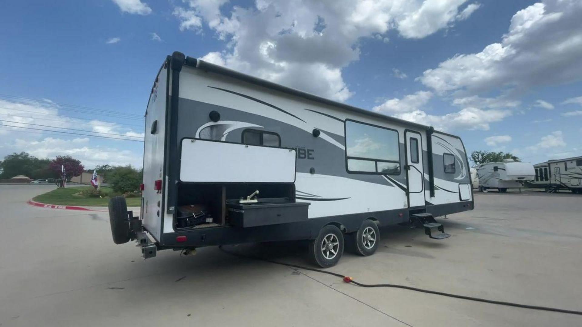 2017 TAN FOREST RIVER VIBE 268RKS (4X4TVBC22H4) , Length: 34.5 ft. | Dry Weight: 6,540 lbs. | Slides: 1 transmission, located at 4319 N Main Street, Cleburne, TX, 76033, (817) 221-0660, 32.435829, -97.384178 - Experience the 2017 Forest River Vibe 268RKS Travel Trailer, which offers the ideal fusion of comfort and style. This travel trailer provides a comfortable living area for your travels and is ideal for both novice and experienced RVers. The dimensions of this unit are 34.5 ft in length, 8 ft in w - Photo#1