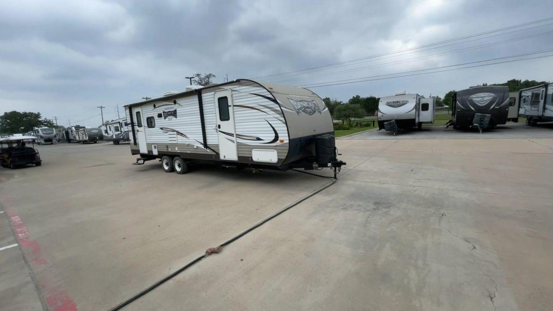 2017 TAN FOREST RIVER WILDWOOD 254RLXL (4X4TWDA23HE) , Length: 30.92 ft. | Dry Weight: 6,063 lbs. | Gross Weight: 7,685 lbs. | Slides: 1 transmission, located at 4319 N Main Street, Cleburne, TX, 76033, (817) 221-0660, 32.435829, -97.384178 - With the 2017 Forest River Wildwood 254RLXL travel trailer, enjoy the fun of camping. This well-thought-out RV is a great option for anyone looking for unforgettable outdoor experiences because it provides the ideal balance of comfort, functionality, and fashionable features. This unit measures 3 - Photo#3