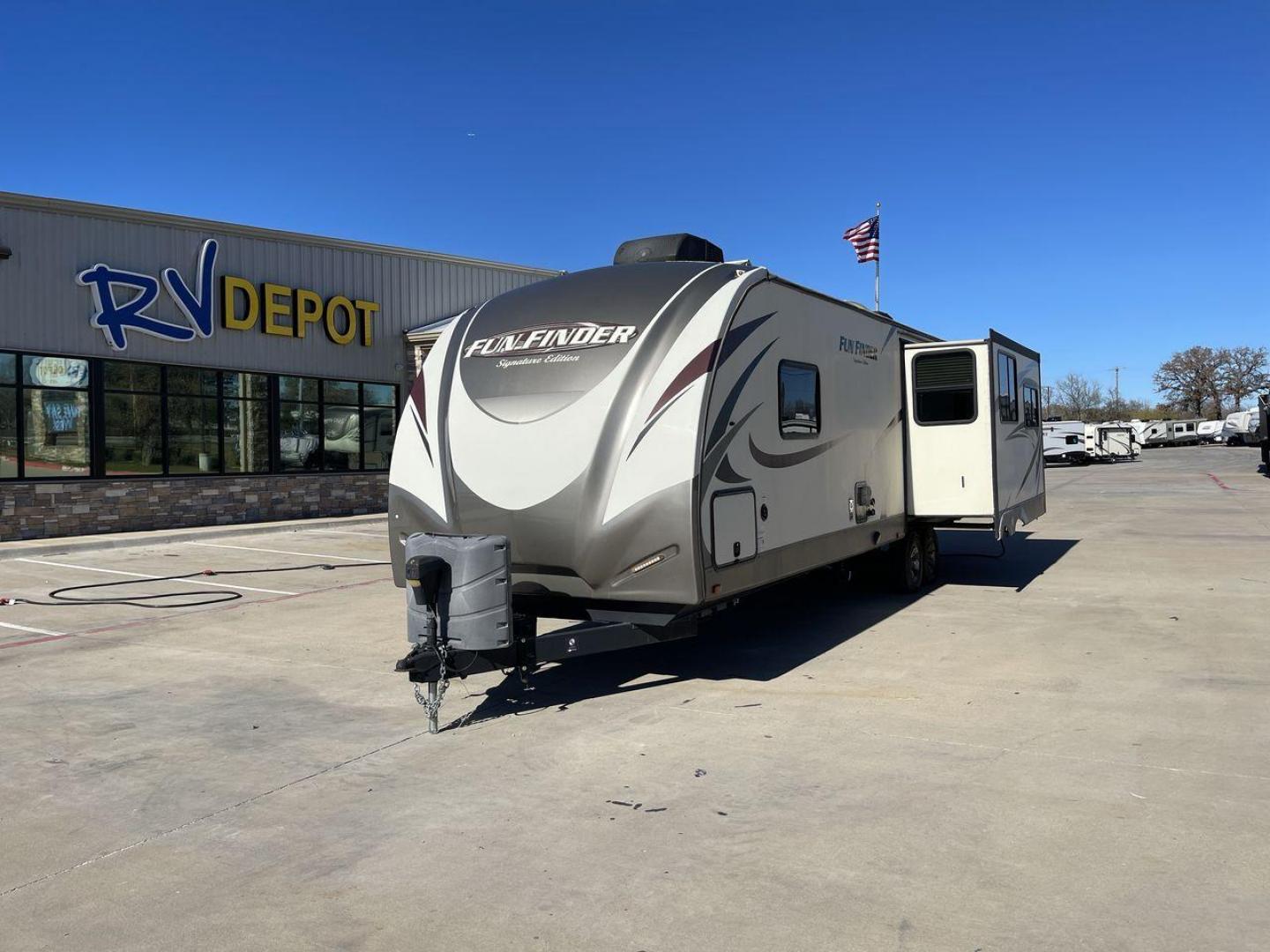 2017 BROWN FUNFINDER 319RLDS (5RXAB3524H1) , Length: 35.5 ft. | Dry Weight: 7,485 lbs. | Gross Weight: 9,760 lbs. | Slides: 2 transmission, located at 4319 N Main Street, Cleburne, TX, 76033, (817) 221-0660, 32.435829, -97.384178 - The 2017 Funfinder 319RLDS travel trailer measures approximately 35.5 ft in length, 8 ft in width, and 11.42 ft in height. The dry weight is about 7,485 lbs, with a payload capacity of 2,275 lbs. It has a GVWR of 9,760 lbs and a hitch weight of 960 lbs. This unit features a double slideout placed at - Photo#0