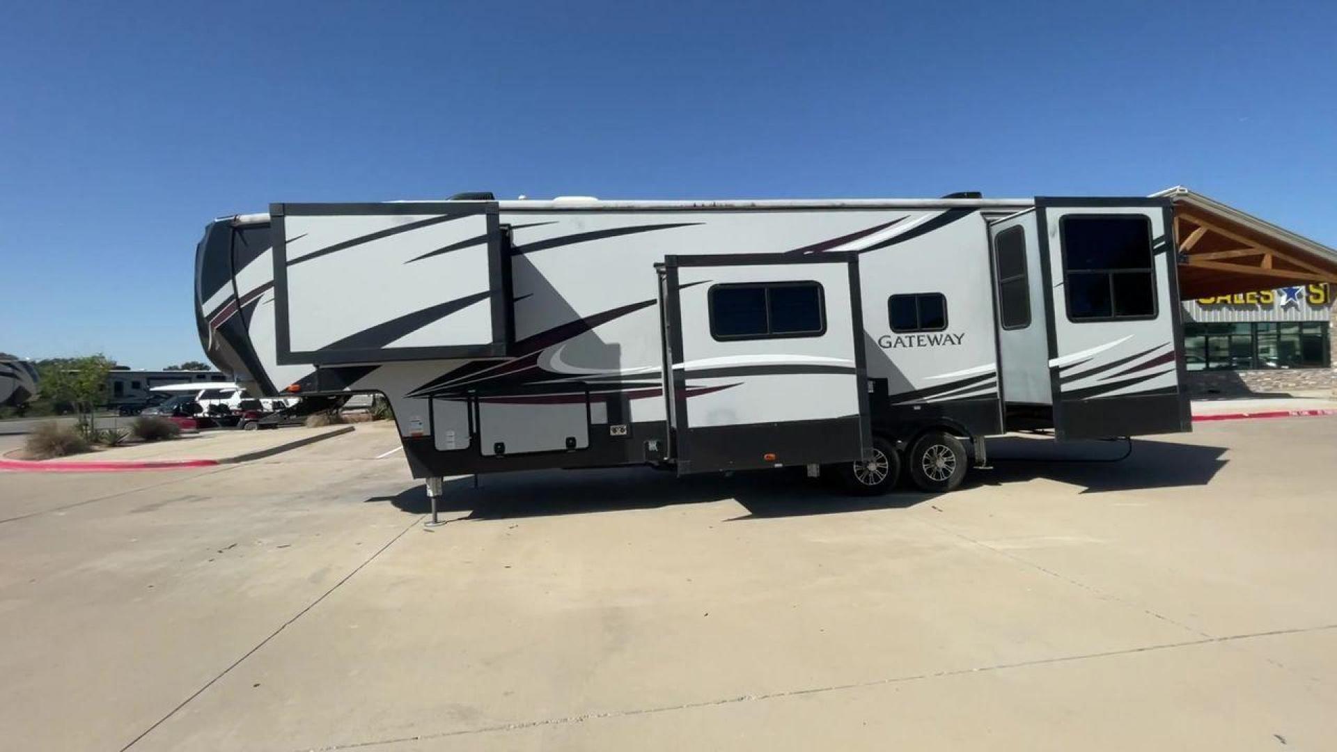 2017 TAN GATEWAY 3712RDMB - (5SFSG4228HE) , Length: 39.5 ft. | Dry Weight: 13,680 lbs. | Gross Weight: 15,500 lbs. | Slides: 4 transmission, located at 4319 N Main Street, Cleburne, TX, 76033, (817) 221-0660, 32.435829, -97.384178 - The 2017 Gateway 3712RDMB Fifth Wheel provides luxurious travel experiences. With a length of 39.5 feet and a dry weight of 13,680 pounds, this amazing RV provides large living accommodations and all of the conveniences you require for a comfortable travel. With a gross weight of 15,500 pounds and f - Photo#8