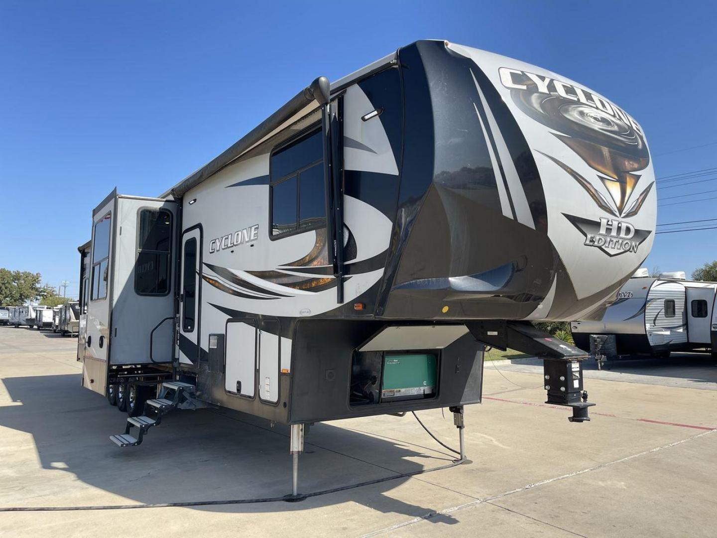 2017 HEARTLAND CYCLONE 4005 (5SFCG4434HE) , Length: 44.1 ft. | Dry Weight: 16,290 lbs.| Gross Weight: 20,000 lbs. | Slides: 3 transmission, located at 4319 N Main Street, Cleburne, TX, 76033, (817) 221-0660, 32.435829, -97.384178 - The 2017 Heartland Cyclone 4005 is a luxury fifth-wheel toy hauler that combines comfort and functionality for adventurers who want the flexibility to bring toys along for the ride. Known for its spacious garage, upscale living area, and ample sleeping options, this model is ideal for thrill-seekers - Photo#23