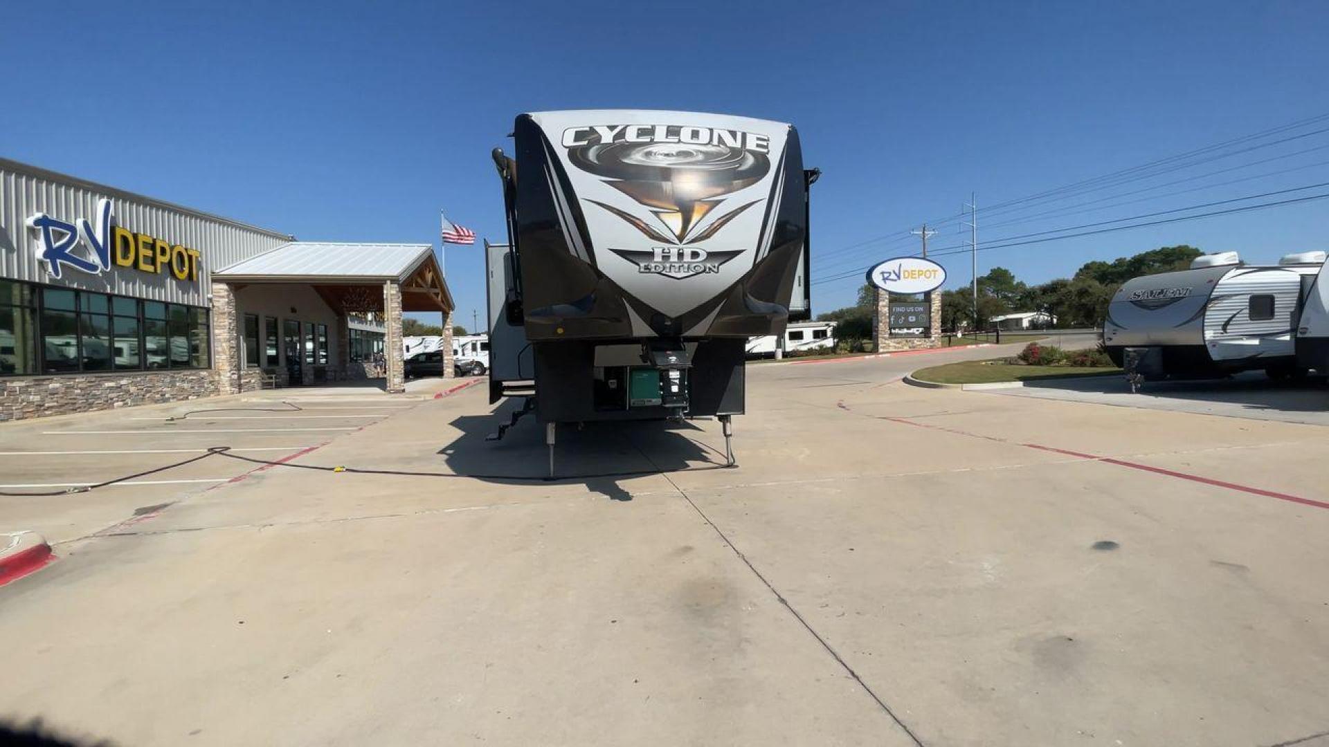 2017 HEARTLAND CYCLONE 4005 (5SFCG4434HE) , Length: 44.1 ft. | Dry Weight: 16,290 lbs.| Gross Weight: 20,000 lbs. | Slides: 3 transmission, located at 4319 N Main Street, Cleburne, TX, 76033, (817) 221-0660, 32.435829, -97.384178 - The 2017 Heartland Cyclone 4005 is a luxury fifth-wheel toy hauler that combines comfort and functionality for adventurers who want the flexibility to bring toys along for the ride. Known for its spacious garage, upscale living area, and ample sleeping options, this model is ideal for thrill-seekers - Photo#4