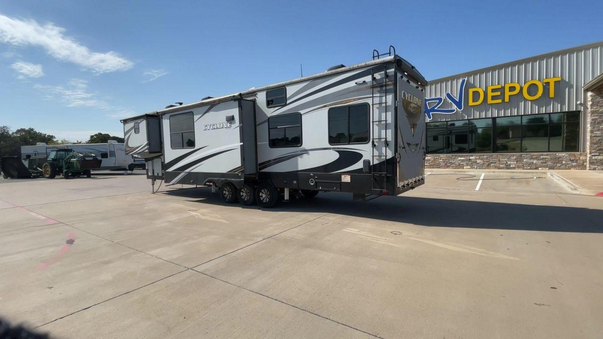 2017 HEARTLAND CYCLONE 4005 (5SFCG4434HE) , Length: 44.1 ft. | Dry Weight: 16,290 lbs.| Gross Weight: 20,000 lbs. | Slides: 3 transmission, located at 4319 N Main Street, Cleburne, TX, 76033, (817) 221-0660, 32.435829, -97.384178 - The 2017 Heartland Cyclone 4005 is a luxury fifth-wheel toy hauler that combines comfort and functionality for adventurers who want the flexibility to bring toys along for the ride. Known for its spacious garage, upscale living area, and ample sleeping options, this model is ideal for thrill-seekers - Photo#7