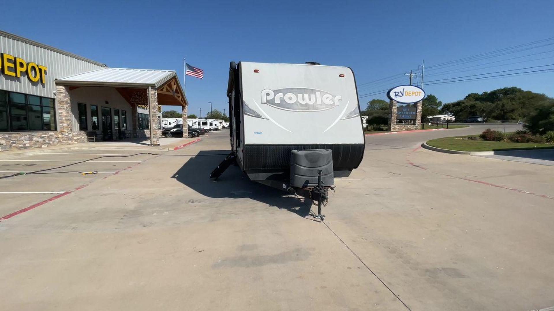 2017 HEARTLAND PROWLER 32LX (5SFPB3622JE) , Length: 36.4 ft. | Dry Weight: 7,880 lbs | Gross Weight: 9,000 lbs | Slides: 2 transmission, located at 4319 N Main Street, Cleburne, TX, 76033, (817) 221-0660, 32.435829, -97.384178 - The 2017 Heartland Prowler 32LX travel trailer has dimensions of 36.4 ft in length, 8 ft width, 11.2 ft height, and 6.8 ft interior height. It has a base weight of 7,880 lbs with a 9,000 lbs GVWR and a carrying capacity of 1,120 lbs. This unit highlights an outdoor kitchen, a rear bunkhouse, a p - Photo#4