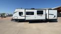 2017 HEARTLAND PROWLER 32LX (5SFPB3622JE) , Length: 36.4 ft. | Dry Weight: 7,880 lbs | Gross Weight: 9,000 lbs | Slides: 2 transmission, located at 4319 N Main Street, Cleburne, TX, 76033, (817) 221-0660, 32.435829, -97.384178 - The 2017 Heartland Prowler 32LX travel trailer has dimensions of 36.4 ft in length, 8 ft width, 11.2 ft height, and 6.8 ft interior height. It has a base weight of 7,880 lbs with a 9,000 lbs GVWR and a carrying capacity of 1,120 lbs. This unit highlights an outdoor kitchen, a rear bunkhouse, a p - Photo#6