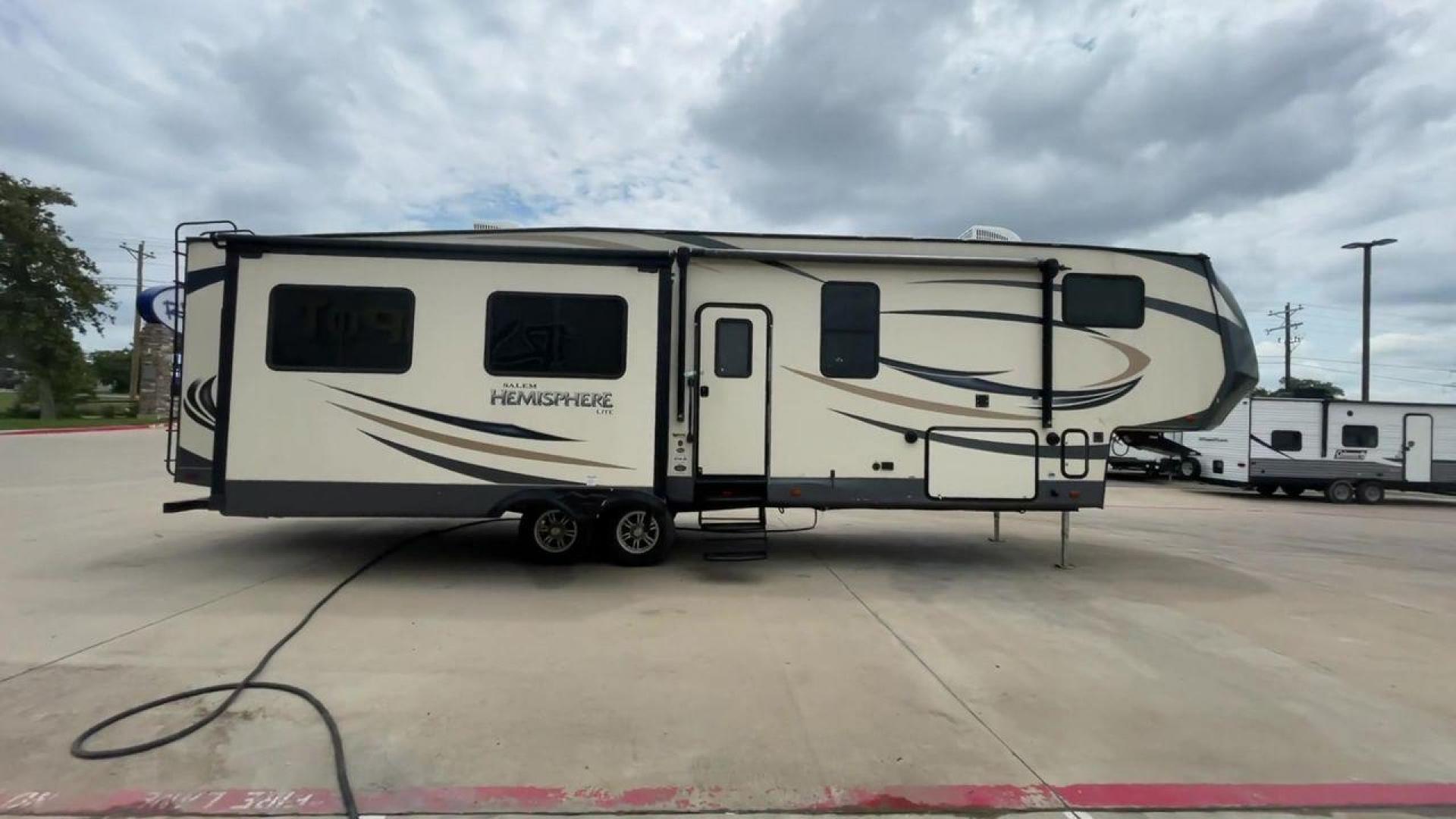 2017 TAN HEMISPHERE 337BAR (4X4FSBK25HV) , Length: 39.58 ft. | Dry Weight: 10,069 lbs. | Slides: 3 transmission, located at 4319 N Main Street, Cleburne, TX, 76033, (817) 221-0660, 32.435829, -97.384178 - This 2017 Forest River Salem Hemisphere Lite 337BAR fifth wheel measures 39.58 feet. It is a dual axle, aluminum wheel setup with electric drum brakes. Its dry weight is 10,069 lbs, its payload capacity is 2,321 lbs, and its hitch weight is 1,990 lbs. The fiberglass exterior is painted white with bl - Photo#23