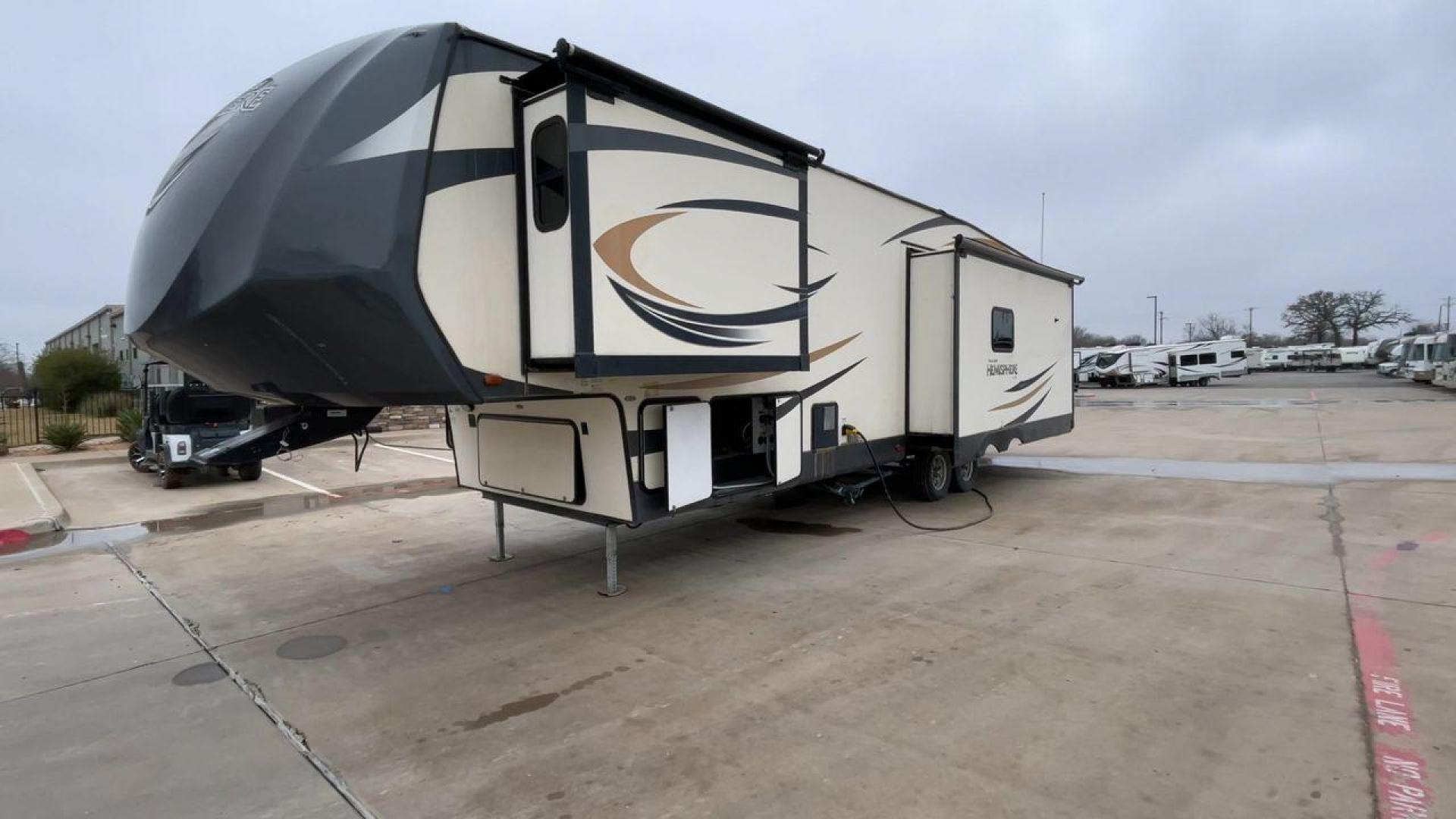 2017 TAN HEMISPHERE 337BAR (4X4FSBK25HV) , Length: 39.58 ft. | Dry Weight: 10,069 lbs. | Slides: 3 transmission, located at 4319 N Main Street, Cleburne, TX, 76033, (817) 221-0660, 32.435829, -97.384178 - This 2017 Forest River Salem Hemisphere Lite 337BAR fifth wheel measures 39.58 feet. It is a dual axle, aluminum wheel setup with electric drum brakes. Its dry weight is 10,069 lbs, its payload capacity is 2,321 lbs, and its hitch weight is 1,990 lbs. The fiberglass exterior is painted white with bl - Photo#5