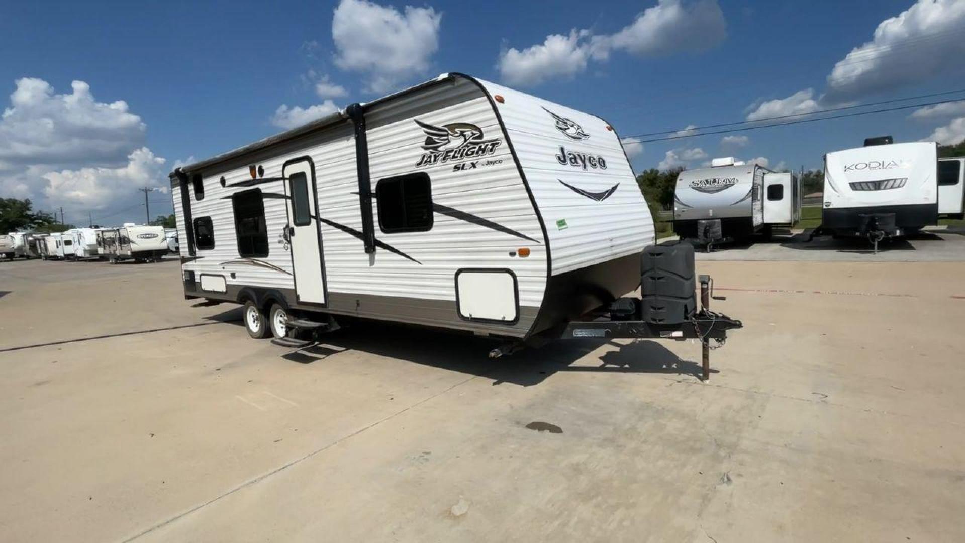 2017 JAYCO JAYFLIGHT 264BH (1UJBJ0BN3H1) , located at 4319 N Main Street, Cleburne, TX, 76033, (817) 221-0660, 32.435829, -97.384178 - The 2017 Jayco Jay Flight 264BH is a well-designed and practical travel trailer. It is ideal for families or groups looking to enjoy the great outdoors with all the comforts of home. This unit is lightweight and easy to tow, yet offers ample space for up to 8 people. The exterior is sleek with alumi - Photo#3