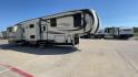 2017 TAN JAYCO NORTH POINT 375BHFS (1UJCJ0BV2H1) , Length: 43.25 ft.| Dry Weight: 13,740 lbs. | Gross Weight: 16,500 lbs. | Slides: 5 transmission, located at 4319 N Main Street, Cleburne, TX, 76033, (817) 221-0660, 32.435829, -97.384178 - Five slides, one-and-a-half baths, a bunkhouse, and an outdoor kitchen are just some of the highlights of this North Point fifth wheel model 375BHFS by Jayco. This fifth wheel measures 43.25 ft in length, 8 ft in width, 13.33 ft in height, and 6.83 ft in interior height. It has a dry weight of 1 - Photo#3