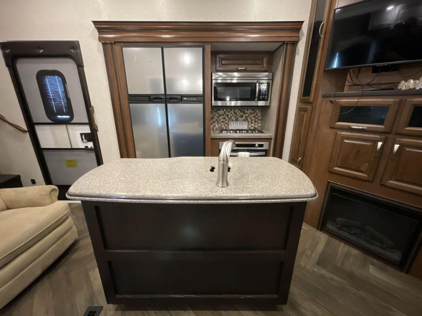 2017 TAN JAYCO NORTH POINT 375BHFS (1UJCJ0BV2H1) , Length: 43.25 ft.| Dry Weight: 13,740 lbs. | Gross Weight: 16,500 lbs. | Slides: 5 transmission, located at 4319 N Main Street, Cleburne, TX, 76033, (817) 221-0660, 32.435829, -97.384178 - Five slides, one-and-a-half baths, a bunkhouse, and an outdoor kitchen are just some of the highlights of this North Point fifth wheel model 375BHFS by Jayco. This fifth wheel measures 43.25 ft in length, 8 ft in width, 13.33 ft in height, and 6.83 ft in interior height. It has a dry weight of 1 - Photo#9