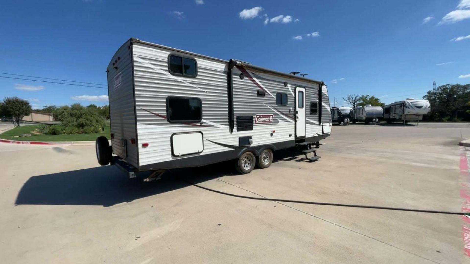 2017 WHITE KEYSTONE COLEMAN 262BH (4YDT26227JH) , Length: 30.58 ft. | Dry Weight: 5,789 lbs. | Slides: 1 transmission, located at 4319 N Main Street, Cleburne, TX, 76033, (817) 221-0660, 32.435829, -97.384178 - The 2017 Keystone Coleman 262BH is a single-slide travel trailer measuring in at 30.58 ft. It has a dry weight of 5,789 lbs. and it comes equipped with a power-retractable awning. Immediately to the left of the entrance is the kitchen. It has a stainless steel faucet, microwave, oven, and refrigerat - Photo#1