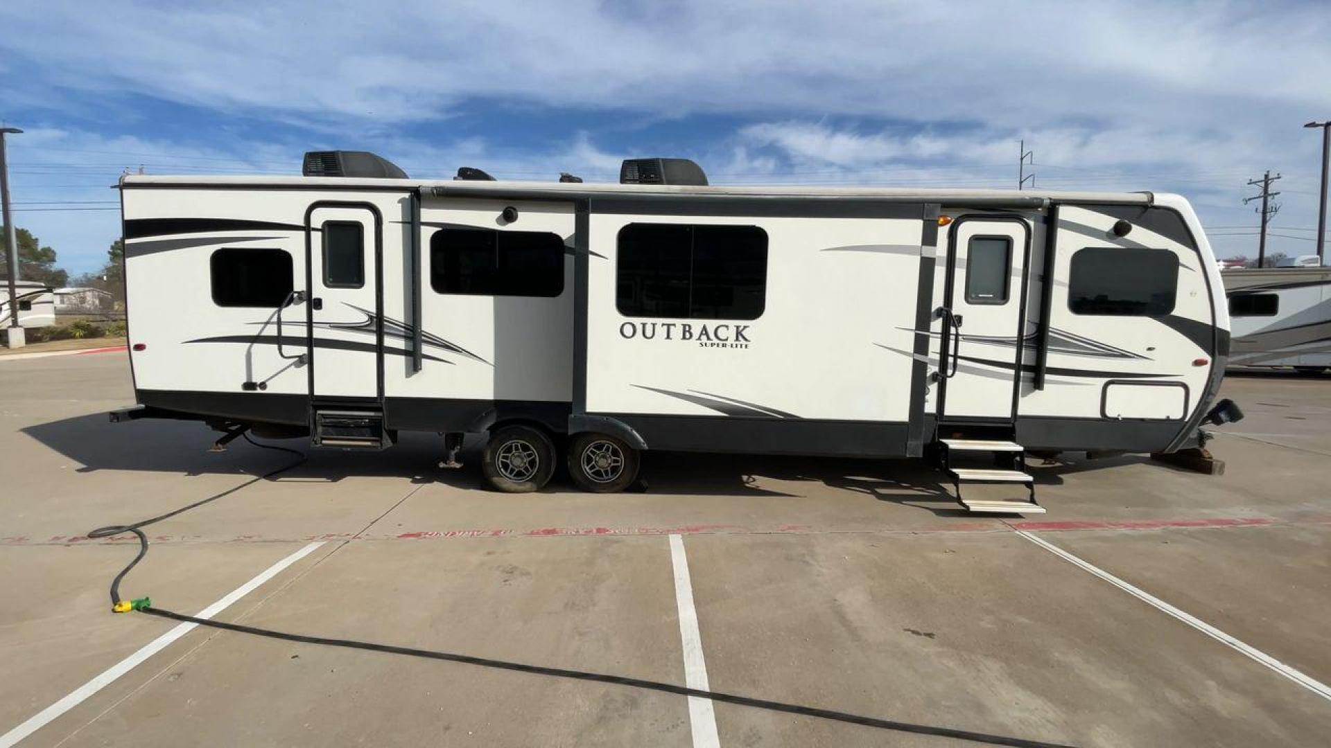 2017 KEYSTONE OUTBACK 332FK (4YDT33229HB) , Length: 37.83 ft. | Dry Weight: 8,475 lbs. | Gross Weight: 10,500 lbs. | Slides: 3 transmission, located at 4319 N Main Street, Cleburne, TX, 76033, (817) 221-0660, 32.435829, -97.384178 - Photo#2