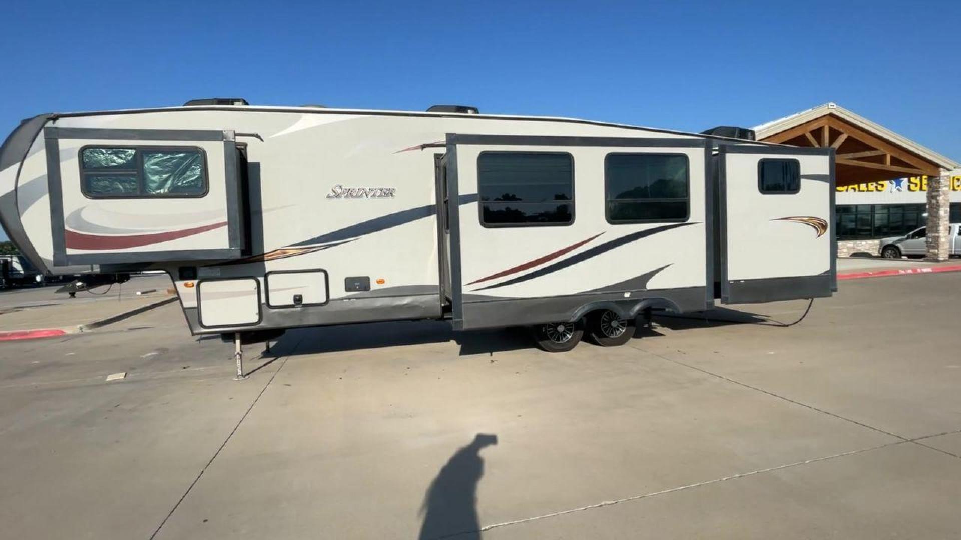 2017 BROWN KEYSTONE SPRINTER 324FWBHS (4YDF32424H1) , Length: 38.83 ft. | Dry Weight: 10,770 lbs. | Gross Weight: 14,000 lbs. | Slides: 3 transmission, located at 4319 N Main Street, Cleburne, TX, 76033, (817) 221-0660, 32.435829, -97.384178 - The 2017 Keystone Sprinter 324FWBHS defines premium residential living on the go. It comes equipped with an outside kitchen with a fridge and cooktop as well as a TV cabinet. It has a large power awning with LED lights to light up your campsite. Inside, you will find a spacious living and kitchen ar - Photo#6