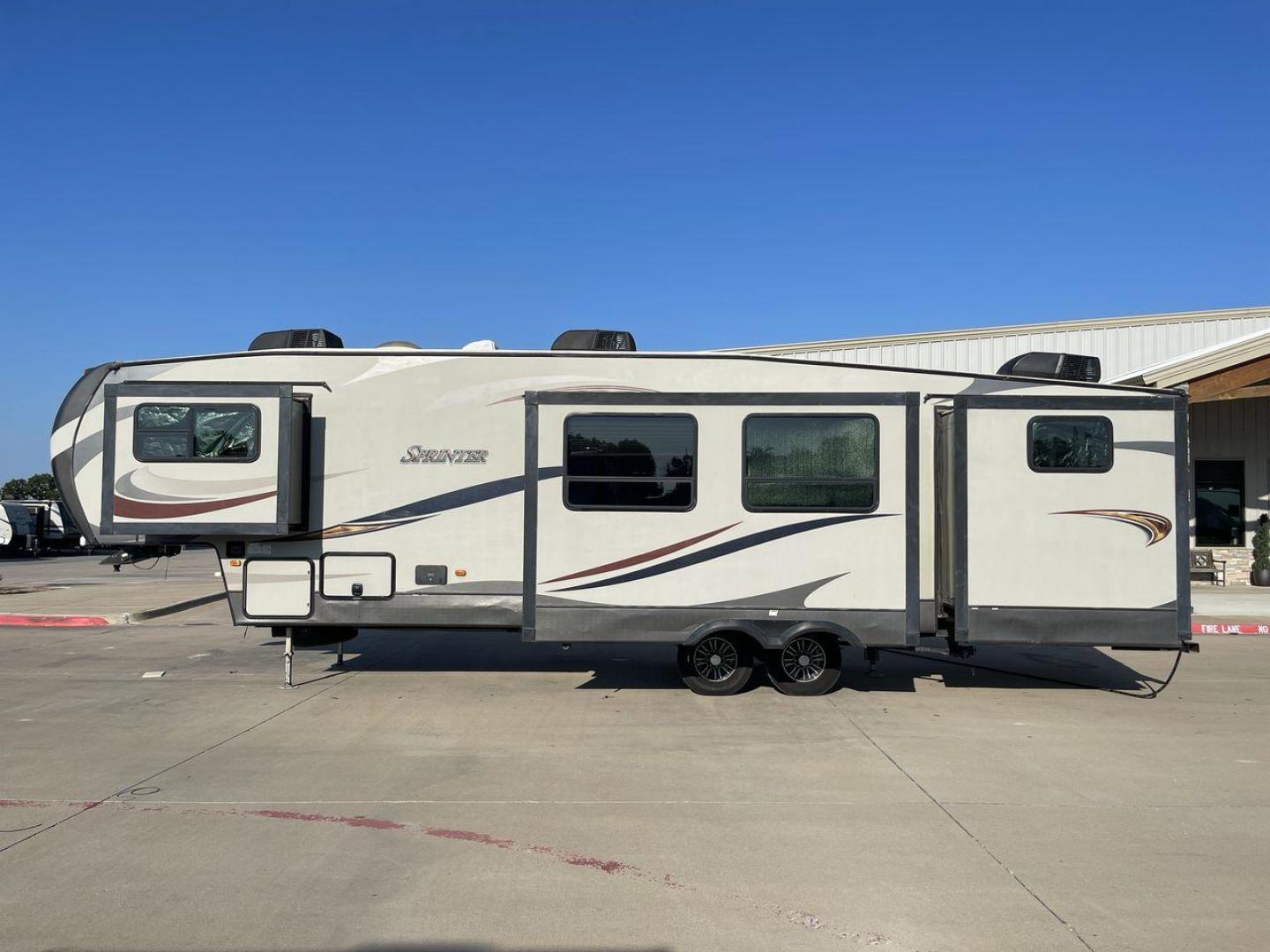 2017 BROWN KEYSTONE SPRINTER 324FWBHS (4YDF32424H1) , Length: 38.83 ft. | Dry Weight: 10,770 lbs. | Gross Weight: 14,000 lbs. | Slides: 3 transmission, located at 4319 N Main Street, Cleburne, TX, 76033, (817) 221-0660, 32.435829, -97.384178 - The 2017 Keystone Sprinter 324FWBHS defines premium residential living on the go. It comes equipped with an outside kitchen with a fridge and cooktop as well as a TV cabinet. It has a large power awning with LED lights to light up your campsite. Inside, you will find a spacious living and kitchen ar - Photo#24