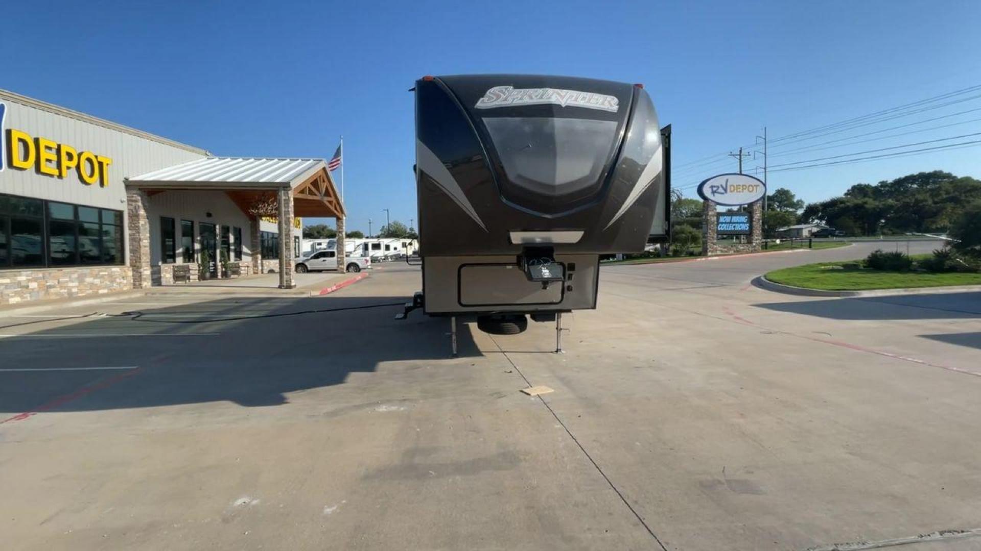 2017 BROWN KEYSTONE SPRINTER 324FWBHS (4YDF32424H1) , Length: 38.83 ft. | Dry Weight: 10,770 lbs. | Gross Weight: 14,000 lbs. | Slides: 3 transmission, located at 4319 N Main Street, Cleburne, TX, 76033, (817) 221-0660, 32.435829, -97.384178 - The 2017 Keystone Sprinter 324FWBHS defines premium residential living on the go. It comes equipped with an outside kitchen with a fridge and cooktop as well as a TV cabinet. It has a large power awning with LED lights to light up your campsite. Inside, you will find a spacious living and kitchen ar - Photo#4