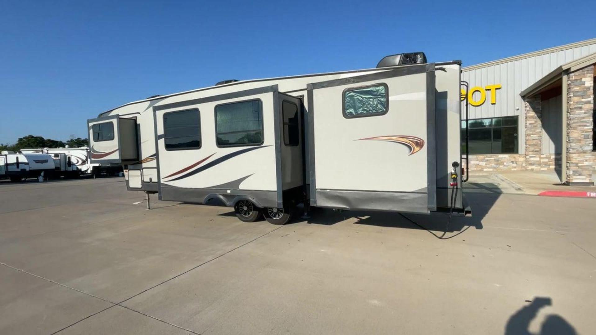 2017 BROWN KEYSTONE SPRINTER 324FWBHS (4YDF32424H1) , Length: 38.83 ft. | Dry Weight: 10,770 lbs. | Gross Weight: 14,000 lbs. | Slides: 3 transmission, located at 4319 N Main Street, Cleburne, TX, 76033, (817) 221-0660, 32.435829, -97.384178 - The 2017 Keystone Sprinter 324FWBHS defines premium residential living on the go. It comes equipped with an outside kitchen with a fridge and cooktop as well as a TV cabinet. It has a large power awning with LED lights to light up your campsite. Inside, you will find a spacious living and kitchen ar - Photo#7