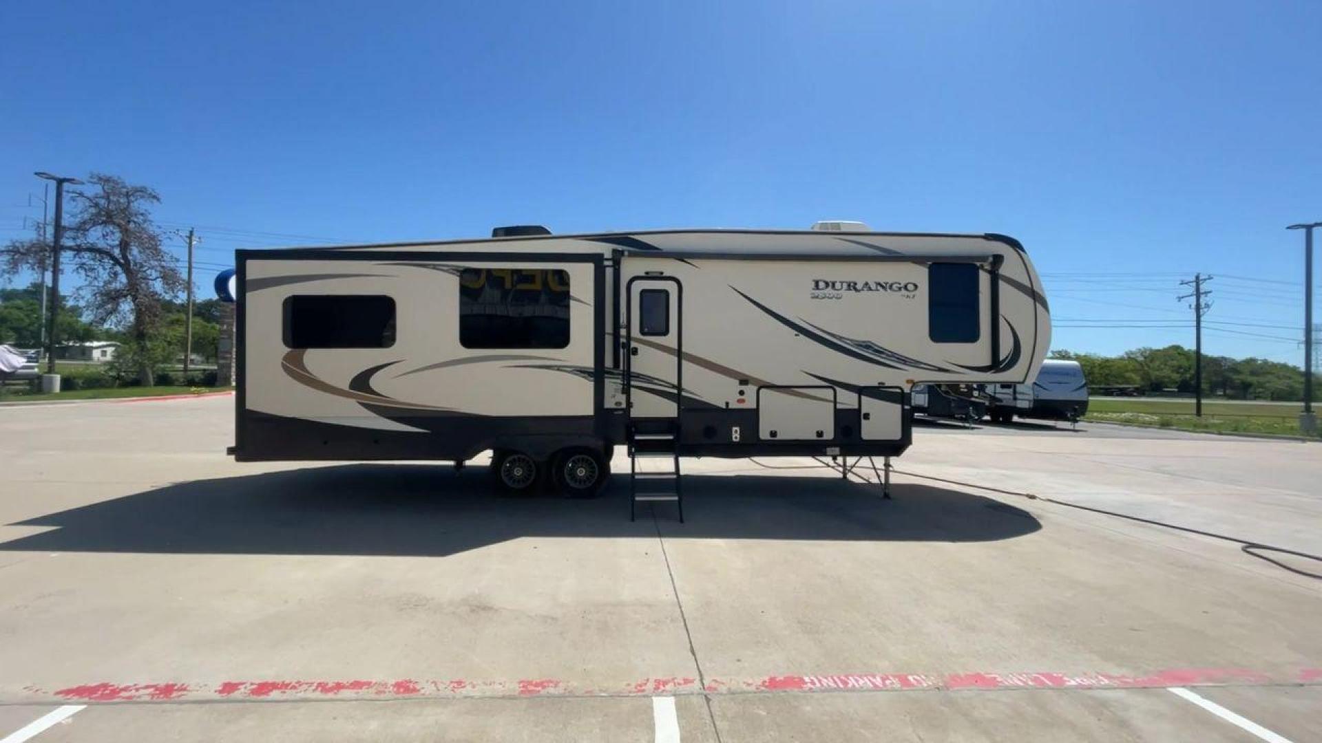 2017 TAN KZ DURANGO 336RET (4EZFD3324H6) , Length: 35.33 ft. | Dry Weight: 10,070 lbs. | Gross Weight: 12,500 lbs. | Slides: 3 transmission, located at 4319 N Main Street, Cleburne, TX, 76033, (817) 221-0660, 32.435829, -97.384178 - The 2017 K-Z Durango 336RET is a fantastic residential fifth wheel with numerous luxurious features you will enjoy in an RV! This Durango measures 35.33 ft. in length and 12.83 ft. in height. It has a dry weight of 10,070 lbs. and a GVWR of 12,500 lbs. You will be able to pull this fifth wheel with - Photo#2