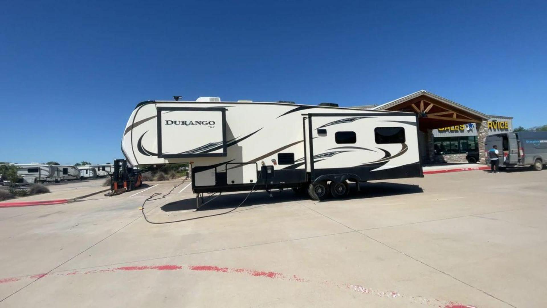 2017 TAN KZ DURANGO 336RET (4EZFD3324H6) , Length: 35.33 ft. | Dry Weight: 10,070 lbs. | Gross Weight: 12,500 lbs. | Slides: 3 transmission, located at 4319 N Main Street, Cleburne, TX, 76033, (817) 221-0660, 32.435829, -97.384178 - The 2017 K-Z Durango 336RET is a fantastic residential fifth wheel with numerous luxurious features you will enjoy in an RV! This Durango measures 35.33 ft. in length and 12.83 ft. in height. It has a dry weight of 10,070 lbs. and a GVWR of 12,500 lbs. You will be able to pull this fifth wheel with - Photo#6