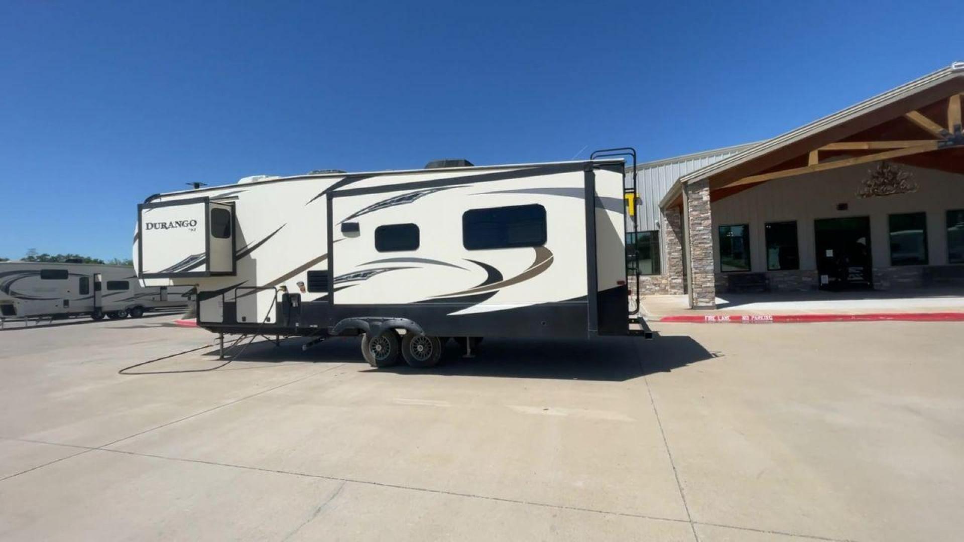 2017 TAN KZ DURANGO 336RET (4EZFD3324H6) , Length: 35.33 ft. | Dry Weight: 10,070 lbs. | Gross Weight: 12,500 lbs. | Slides: 3 transmission, located at 4319 N Main Street, Cleburne, TX, 76033, (817) 221-0660, 32.435829, -97.384178 - The 2017 K-Z Durango 336RET is a fantastic residential fifth wheel with numerous luxurious features you will enjoy in an RV! This Durango measures 35.33 ft. in length and 12.83 ft. in height. It has a dry weight of 10,070 lbs. and a GVWR of 12,500 lbs. You will be able to pull this fifth wheel with - Photo#7