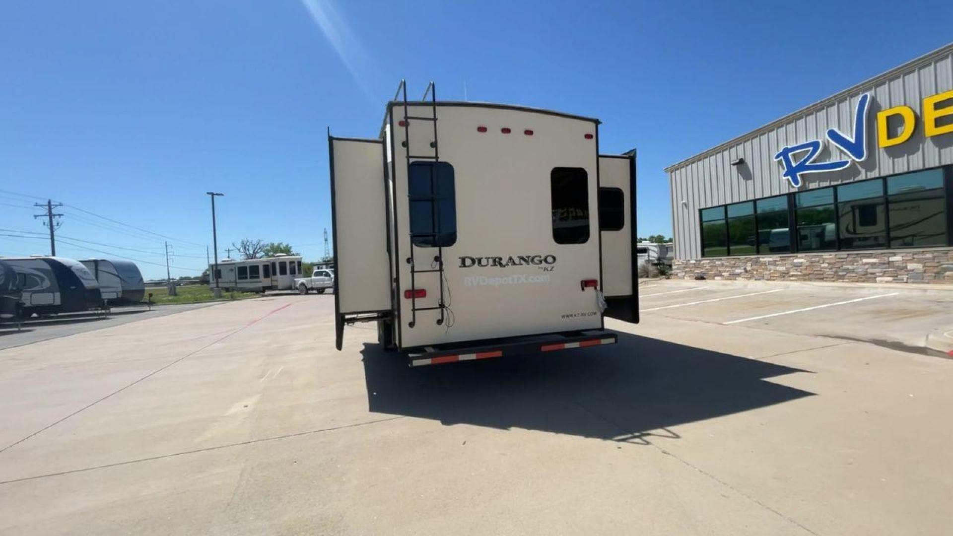 2017 TAN KZ DURANGO 336RET (4EZFD3324H6) , Length: 35.33 ft. | Dry Weight: 10,070 lbs. | Gross Weight: 12,500 lbs. | Slides: 3 transmission, located at 4319 N Main Street, Cleburne, TX, 76033, (817) 221-0660, 32.435829, -97.384178 - The 2017 K-Z Durango 336RET is a fantastic residential fifth wheel with numerous luxurious features you will enjoy in an RV! This Durango measures 35.33 ft. in length and 12.83 ft. in height. It has a dry weight of 10,070 lbs. and a GVWR of 12,500 lbs. You will be able to pull this fifth wheel with - Photo#8