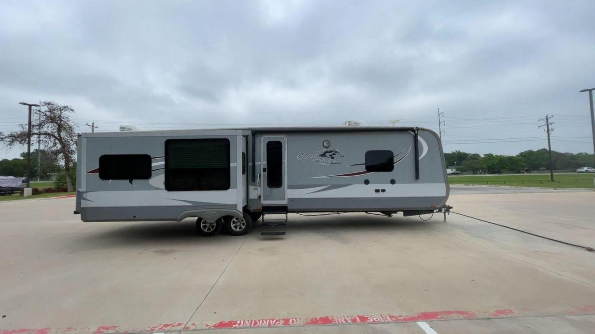 2017 OPEN RANGE ROAMER 323RLS (58TTL3821H5) , Length: 37.7 ft | Dry Weight: 8,815 lbs. | Gross Weight: 11,435 lbs | Slides: 3 transmission, located at 4319 N Main Street, Cleburne, TX, 76033, (817) 221-0660, 32.435829, -97.384178 - The 2017 Open Range Roamer 323RLS is a top-of-the-line travel trailer. With a length of 37.7 feet and a dry weight of 8,815 pounds, this spacious model offers plenty of room for relaxation and entertainment. Featuring three slides, the Roamer 323RLS maximizes interior space, creating a welcoming and - Photo#2