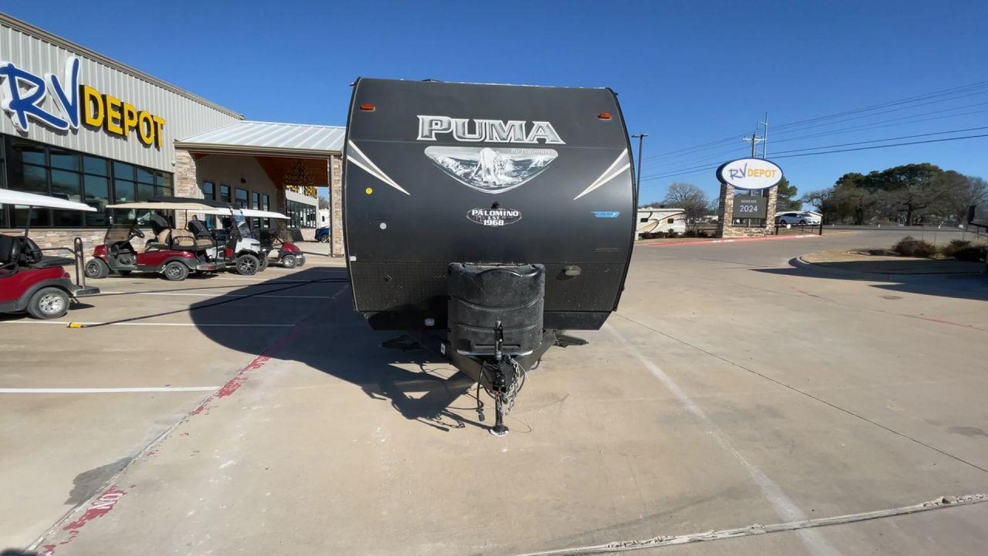 2017 PUMA XLITE28FQDB (4X4TPUD22HP) , Length: 33 ft | Dry Weight: 6,370 lbs | Gross Weight: 8,000 lbs | Slides: 1 transmission, located at 4319 N Main Street, Cleburne, TX, 76033, (817) 221-0660, 32.435829, -97.384178 - The 2017 Puma 28FQDB travel trailer is ideal for family excursions. With a length of 33 feet and a dry weight of 6,370 pounds, this RV is both large and lightweight, making it simple to tow and navigate on the road. With an outdoor kitchen and a large 20-foot motorized awning, you can enjoy outdoor - Photo#4