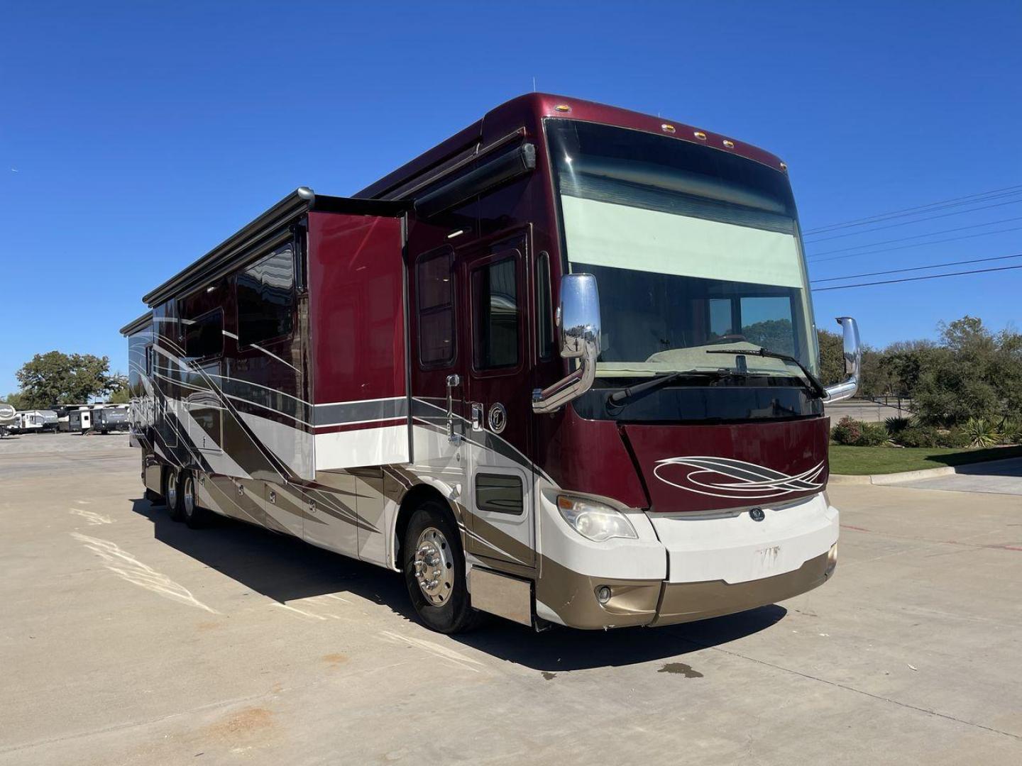 2017 TIFFIN ALLEGRO BUS 45OPP (5VBBAK7A6HA) , Length: 45 ft | Gross Weight: 51,000 lbs | Slides: 4 transmission, located at 4319 N Main Street, Cleburne, TX, 76033, (817) 221-0660, 32.435829, -97.384178 - The 2017 TIFFIN ALLEGRO BUS 45OPP features a luxurious exterior with a striking maroon, white, and beige paint scheme. The large, sleek side panels are accentuated by elegant, sweeping graphics, giving it an upscale, eye-catching look. The motorhome is built on a spacious chassis, with a prominent f - Photo#23