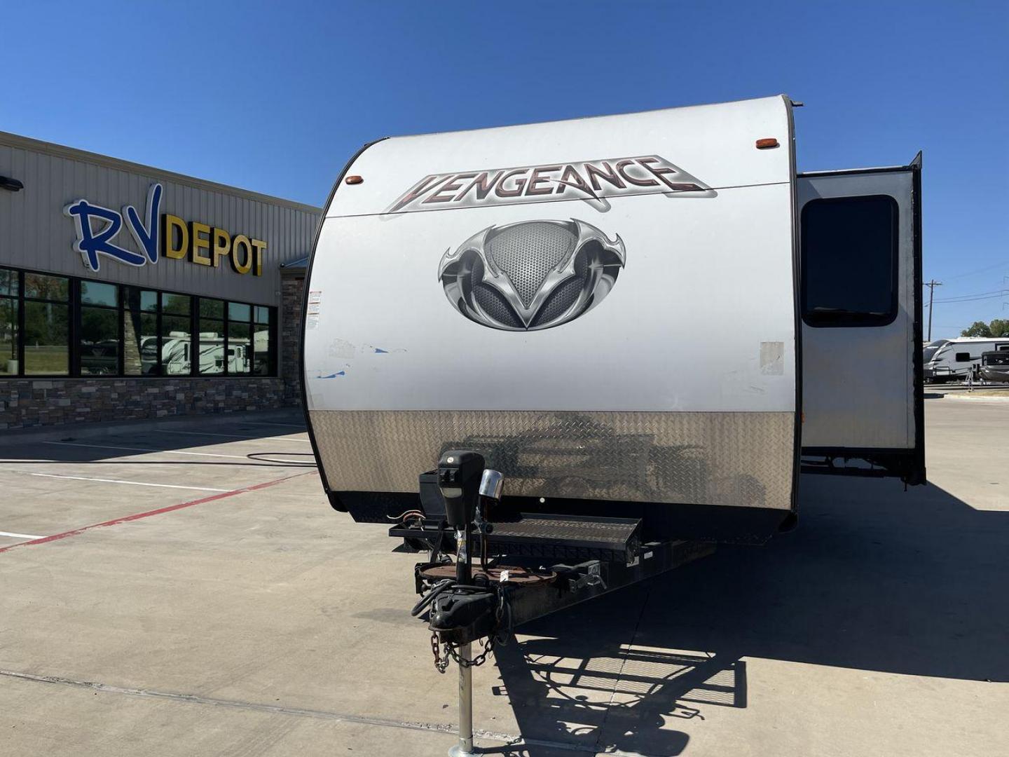 2017 WHITE VENGEANCE 29V (4X4TVGE29HY) , Length: 34.5 ft. | Dry Weight: 7,789 lbs. | Gross Weight: 11,370 lbs. | Slides: 1 transmission, located at 4319 N Main Street, Cleburne, TX, 76033, (817) 221-0660, 32.435829, -97.384178 - The 2017 Vengeance 29V toy hauler will let you unleash your sense of adventure. Designed to meet your travel demands as well as your love of outdoor toys, this tough and feature-rich RV is the ideal balance of comfort and utility. This toy hauler measures 34.5 ft in length, 8.5 ft in width, and 12.0 - Photo#0