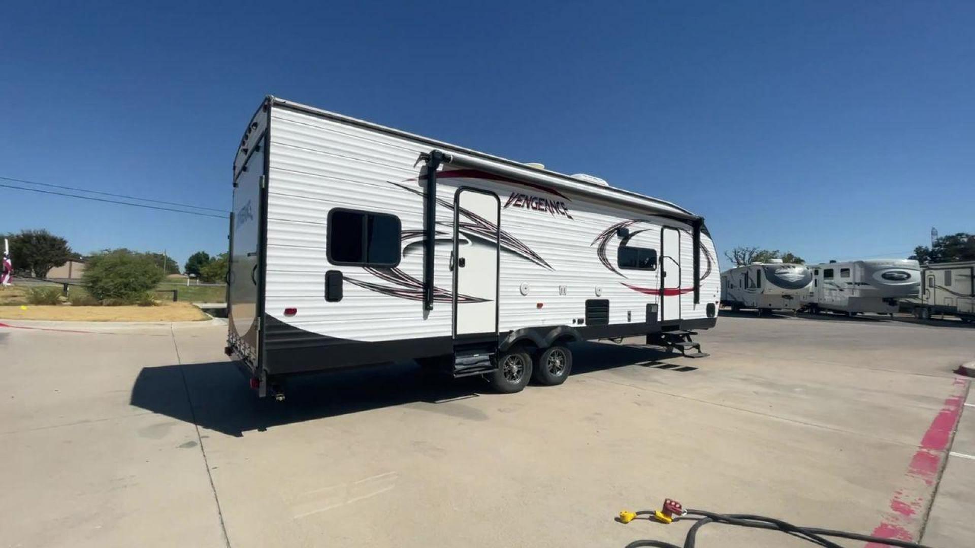 2017 WHITE VENGEANCE 29V (4X4TVGE29HY) , Length: 34.5 ft. | Dry Weight: 7,789 lbs. | Gross Weight: 11,370 lbs. | Slides: 1 transmission, located at 4319 N Main Street, Cleburne, TX, 76033, (817) 221-0660, 32.435829, -97.384178 - The 2017 Vengeance 29V toy hauler will let you unleash your sense of adventure. Designed to meet your travel demands as well as your love of outdoor toys, this tough and feature-rich RV is the ideal balance of comfort and utility. This toy hauler measures 34.5 ft in length, 8.5 ft in width, and 12.0 - Photo#1