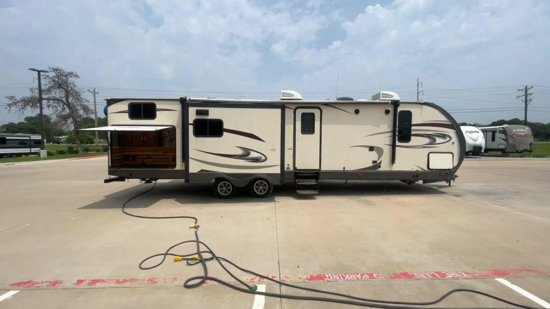 2017 TAN WILDWOOD HERITAGE GLEN 300BH (4X4TWBF29HU) , Length: 37.42 ft. | Dry Weight: 8,439 lbs. | Slides: 3 transmission, located at 4319 N Main Street, Cleburne, TX, 76033, (817) 221-0660, 32.435829, -97.384178 - The 2017 Wildwood Heritage Glen 300BH has roomy and comfortable rooms for your outdoor activities. This travel trailer offers ample space for the entire family, measuring 37.42 feet in length and weighing 8,439 pounds when dry. This trailer is designed with three slides, providing ample interior spa - Photo#2