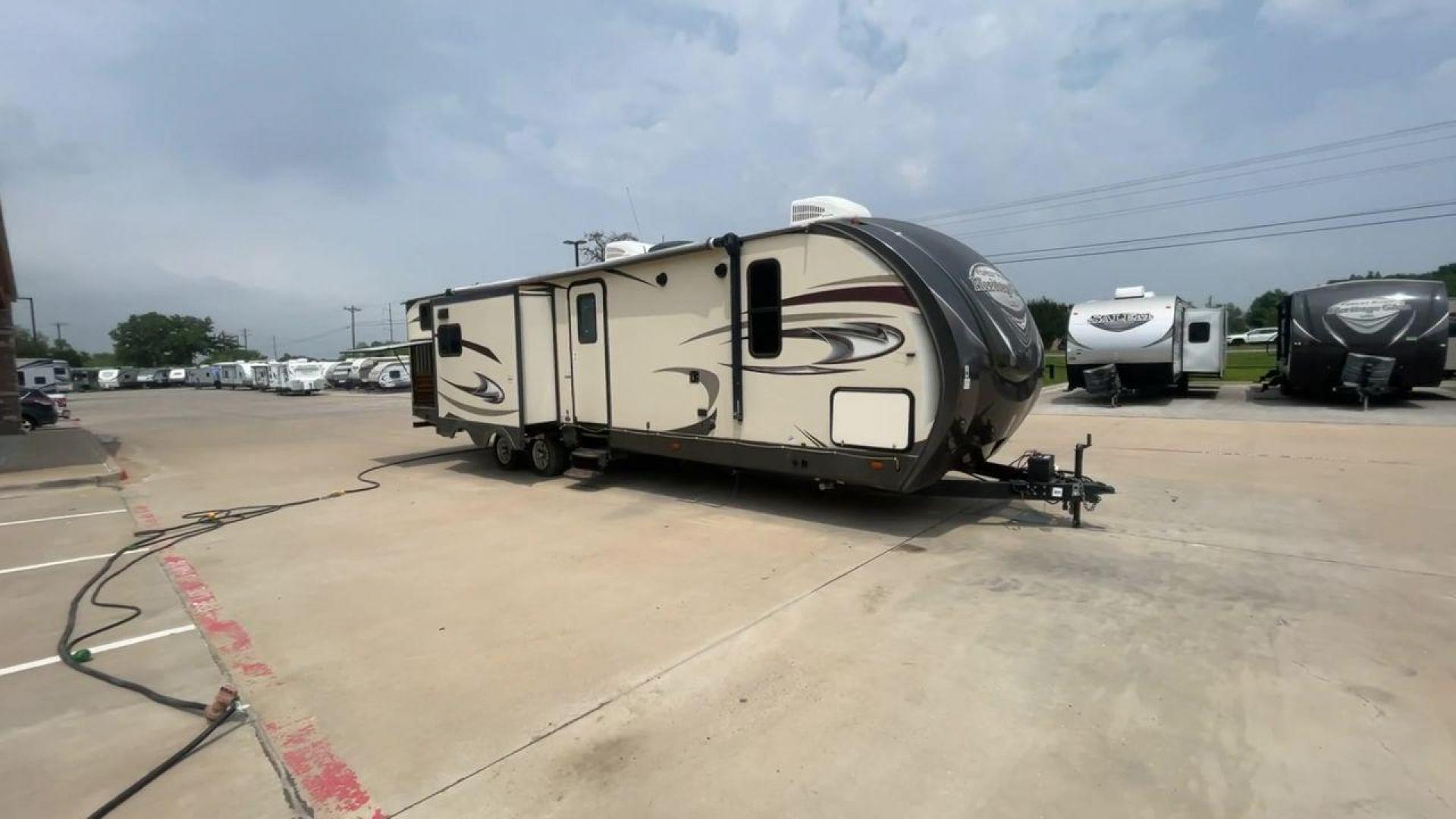 2017 TAN WILDWOOD HERITAGE GLEN 300BH (4X4TWBF29HU) , Length: 37.42 ft. | Dry Weight: 8,439 lbs. | Slides: 3 transmission, located at 4319 N Main Street, Cleburne, TX, 76033, (817) 221-0660, 32.435829, -97.384178 - The 2017 Wildwood Heritage Glen 300BH has roomy and comfortable rooms for your outdoor activities. This travel trailer offers ample space for the entire family, measuring 37.42 feet in length and weighing 8,439 pounds when dry. This trailer is designed with three slides, providing ample interior spa - Photo#3