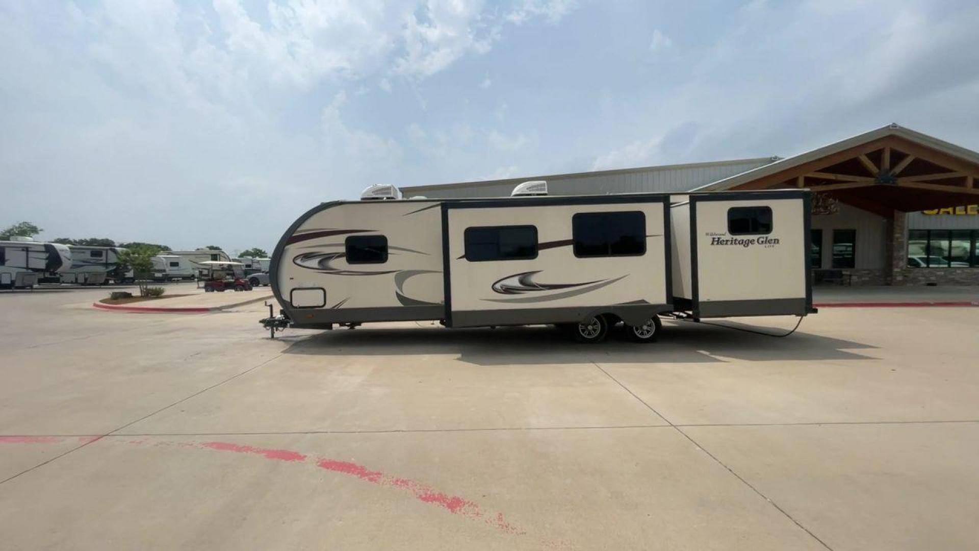 2017 TAN WILDWOOD HERITAGE GLEN 300BH (4X4TWBF29HU) , Length: 37.42 ft. | Dry Weight: 8,439 lbs. | Slides: 3 transmission, located at 4319 N Main Street, Cleburne, TX, 76033, (817) 221-0660, 32.435829, -97.384178 - The 2017 Wildwood Heritage Glen 300BH has roomy and comfortable rooms for your outdoor activities. This travel trailer offers ample space for the entire family, measuring 37.42 feet in length and weighing 8,439 pounds when dry. This trailer is designed with three slides, providing ample interior spa - Photo#6