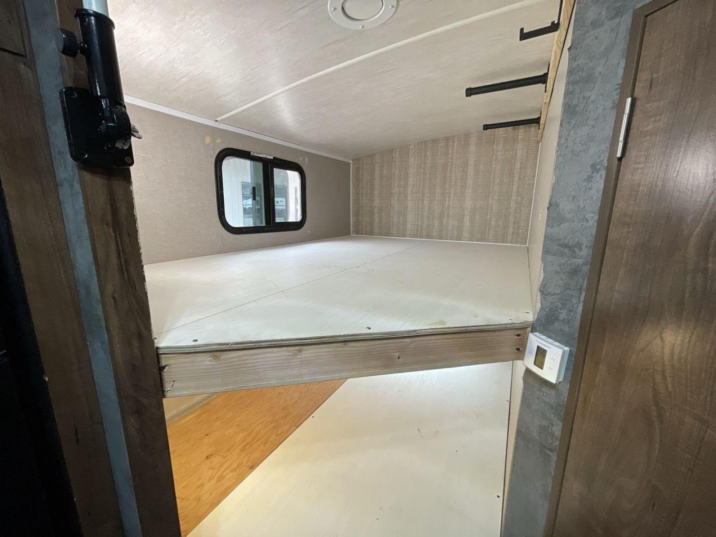 2018 TAN CRUISER RV MPG 2400BH (5RXHB2927J2) , Length: 29.08 ft. | Dry Weight: 5,320 lbs. | Gross Weight: 7,565 lbs. | Slides: 1 transmission, located at 4319 N Main Street, Cleburne, TX, 76033, (817) 221-0660, 32.435829, -97.384178 - Camping is more enjoyable when you include a few more of your friends. In this 2018 Cruiser MPG 2400BH travel trailer, you can accommodate a few extra guests thanks to a rear set of double-sized bunk beds. The dimensions of this unit are 29.08 ft in length, 8 ft in width, 11.08 ft in height, and - Photo#14