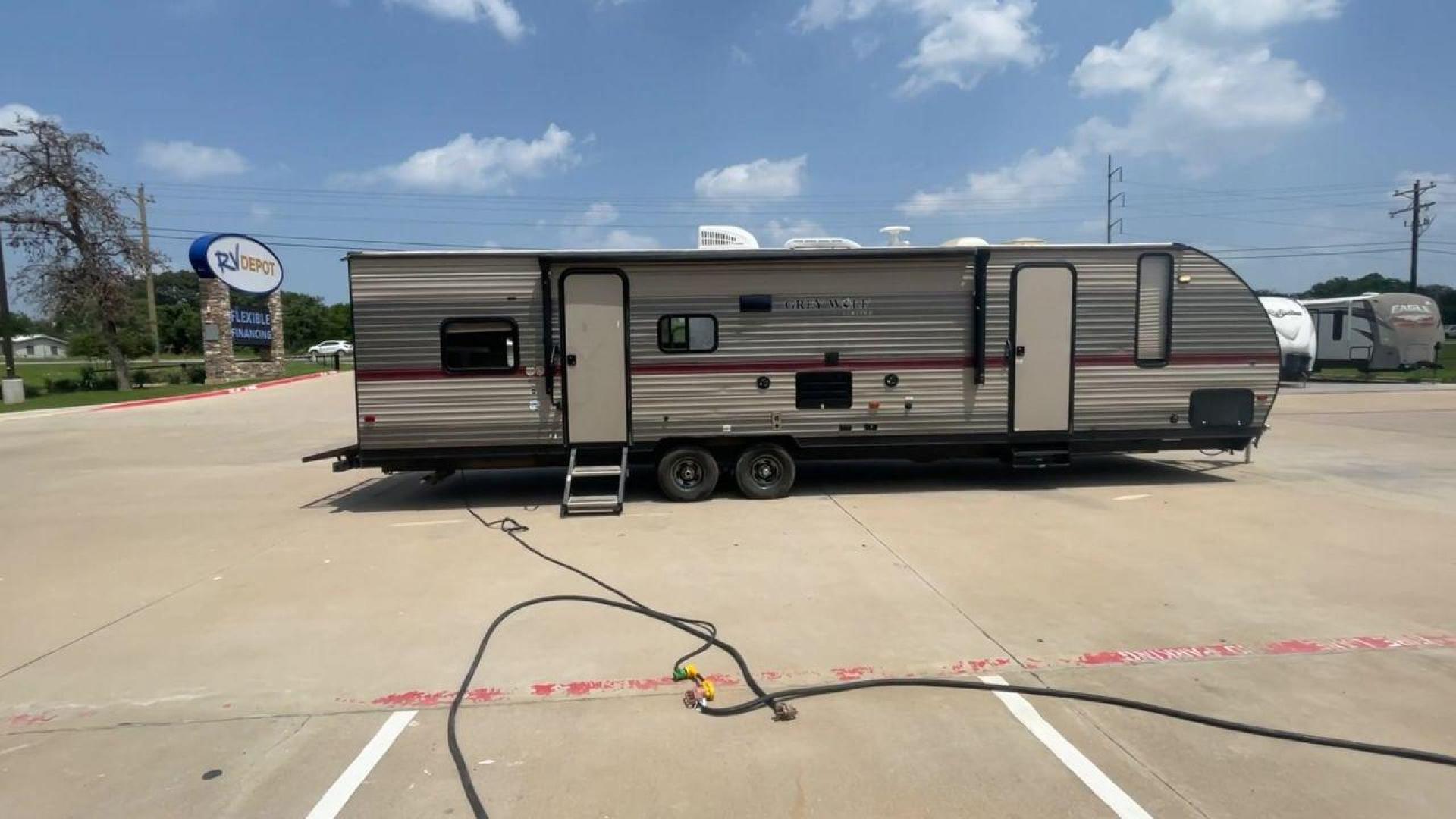 2018 TAN FOREST RIVER GREY WOLF 29TE (4X4TCKE25JX) , Length: 33.33 ft | Dry Weight: 5,960 lbs | Gross Weight: 7,934 lbs | Slides: 1 transmission, located at 4319 N Main Street, Cleburne, TX, 76033, (817) 221-0660, 32.435829, -97.384178 - In the 2019 Forest River Grey Wolf 29TE Travel Trailer, you can enjoy the best of both comfort and excitement. This trailer will help you have the best vacations and adventures, whether you're hitting the open road or exploring your favorite campsite. The Grey Wolf is 33.33 feet long and weighs 5,96 - Photo#2