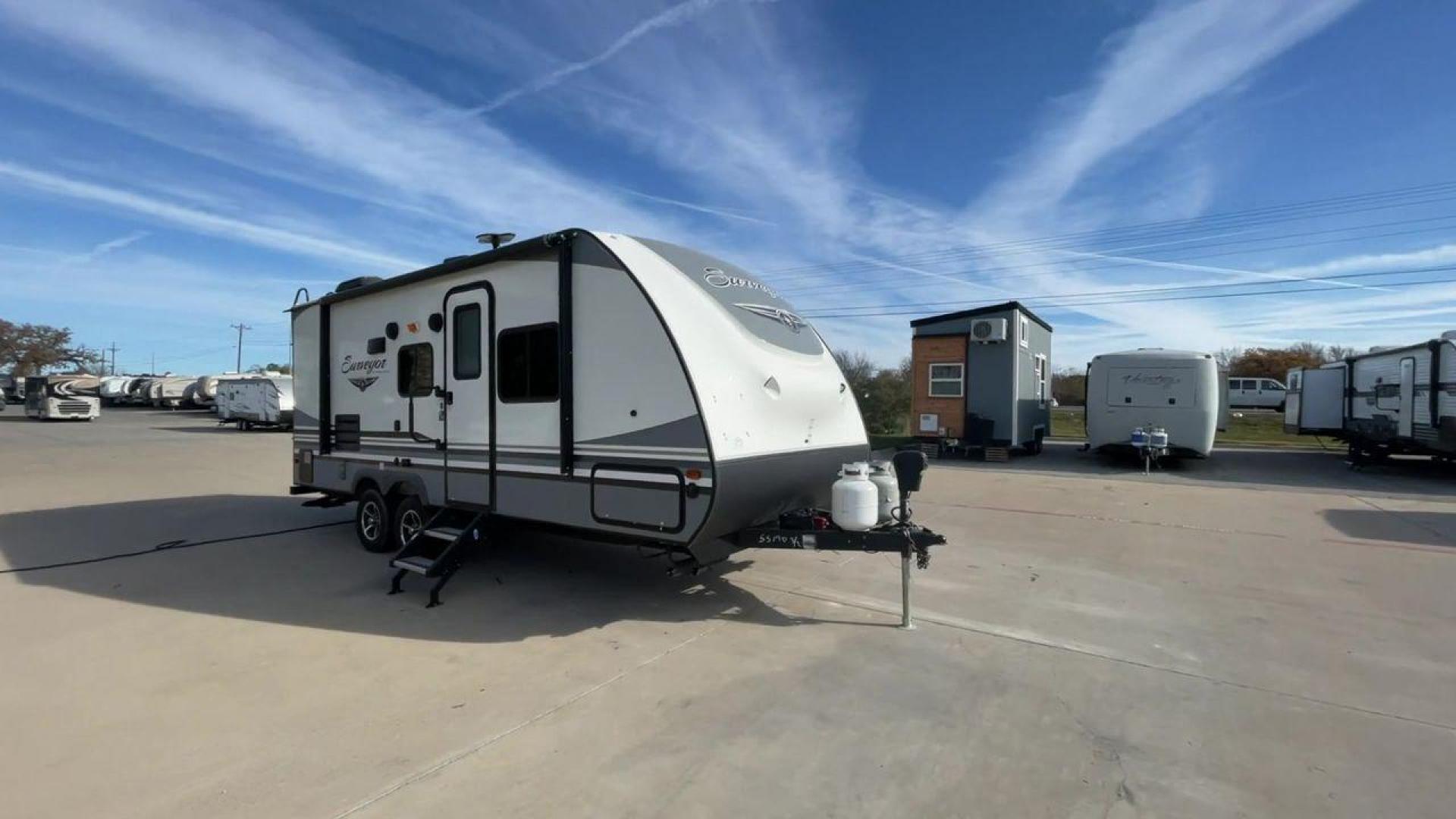 2018 FOREST RIVER SURVEYOR 201RBS (4X4TSVV27JL) , located at 4319 N Main Street, Cleburne, TX, 76033, (817) 221-0660, 32.435829, -97.384178 - The 2018 Forest River Surveyor 201RBS, tailored for adventure enthusiasts who refuse to compromise on luxury. Whether you're a seasoned traveler or a weekend warrior, the Surveyor 201RBS is your ultimate companion on the open road. With exterior dimensions measuring 24 feet in length, 8 feet in widt - Photo#3